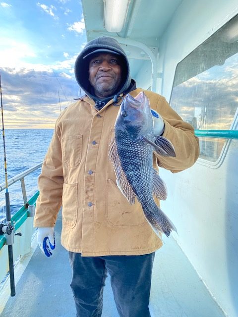 a person standing posing for the camera