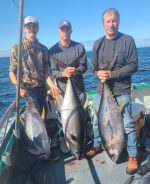 a man holding a fish