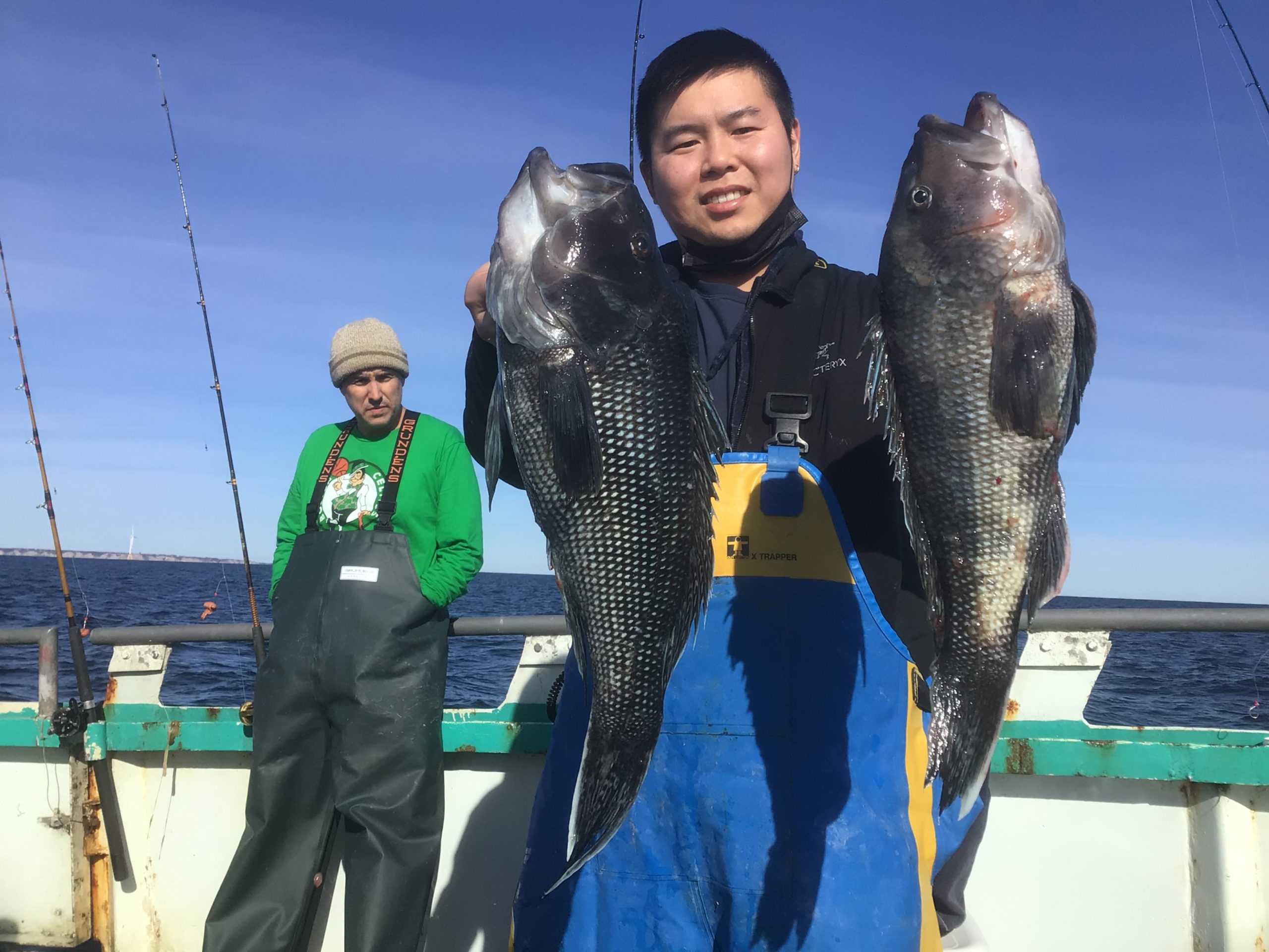 Evan Seinfeld holding a fish