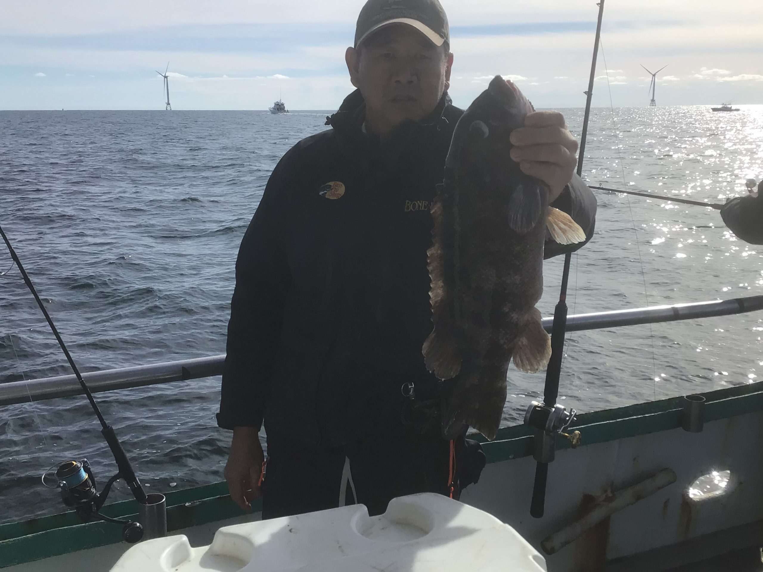 a man water skiing behind a boat