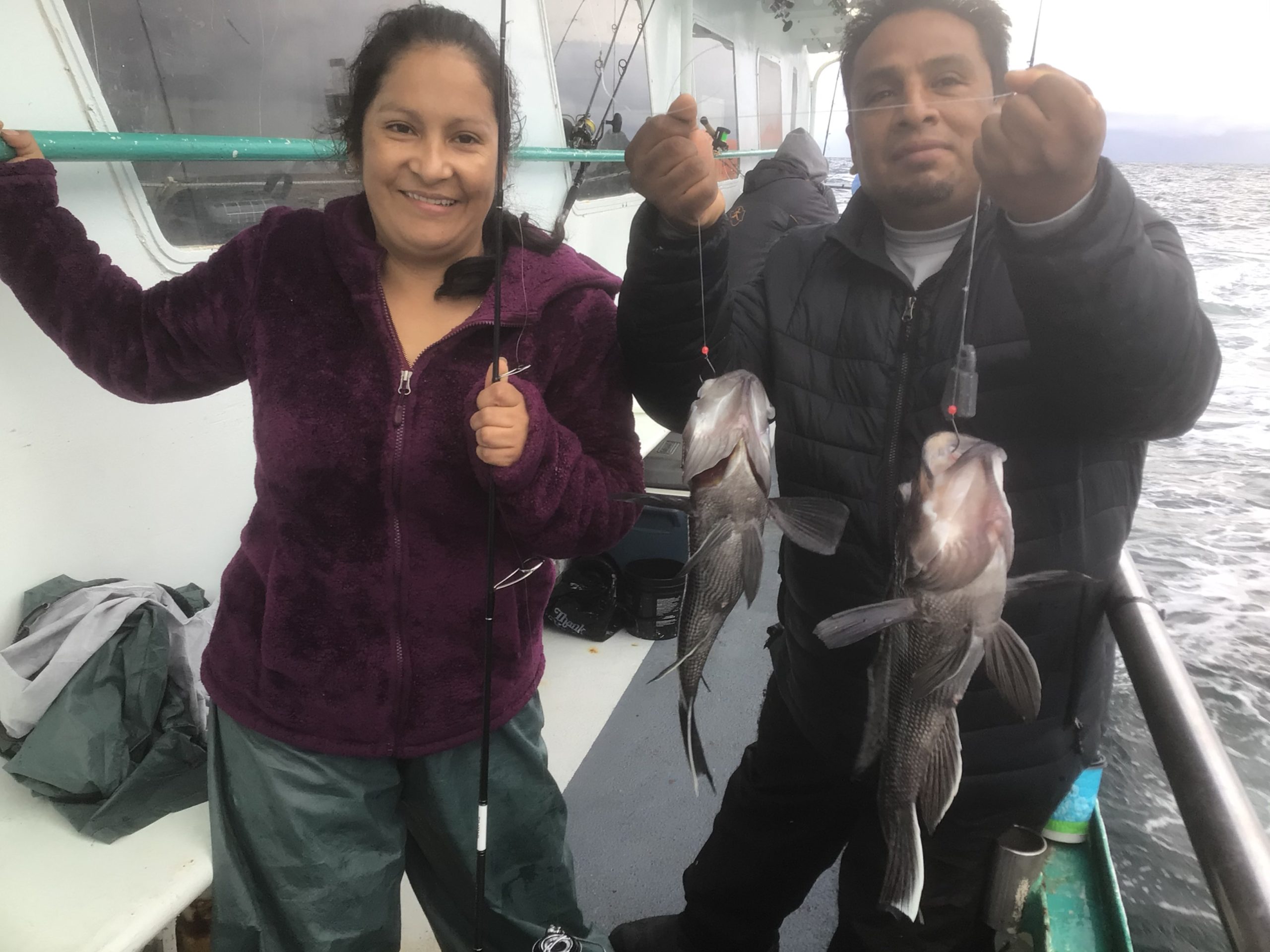 a person holding a fish