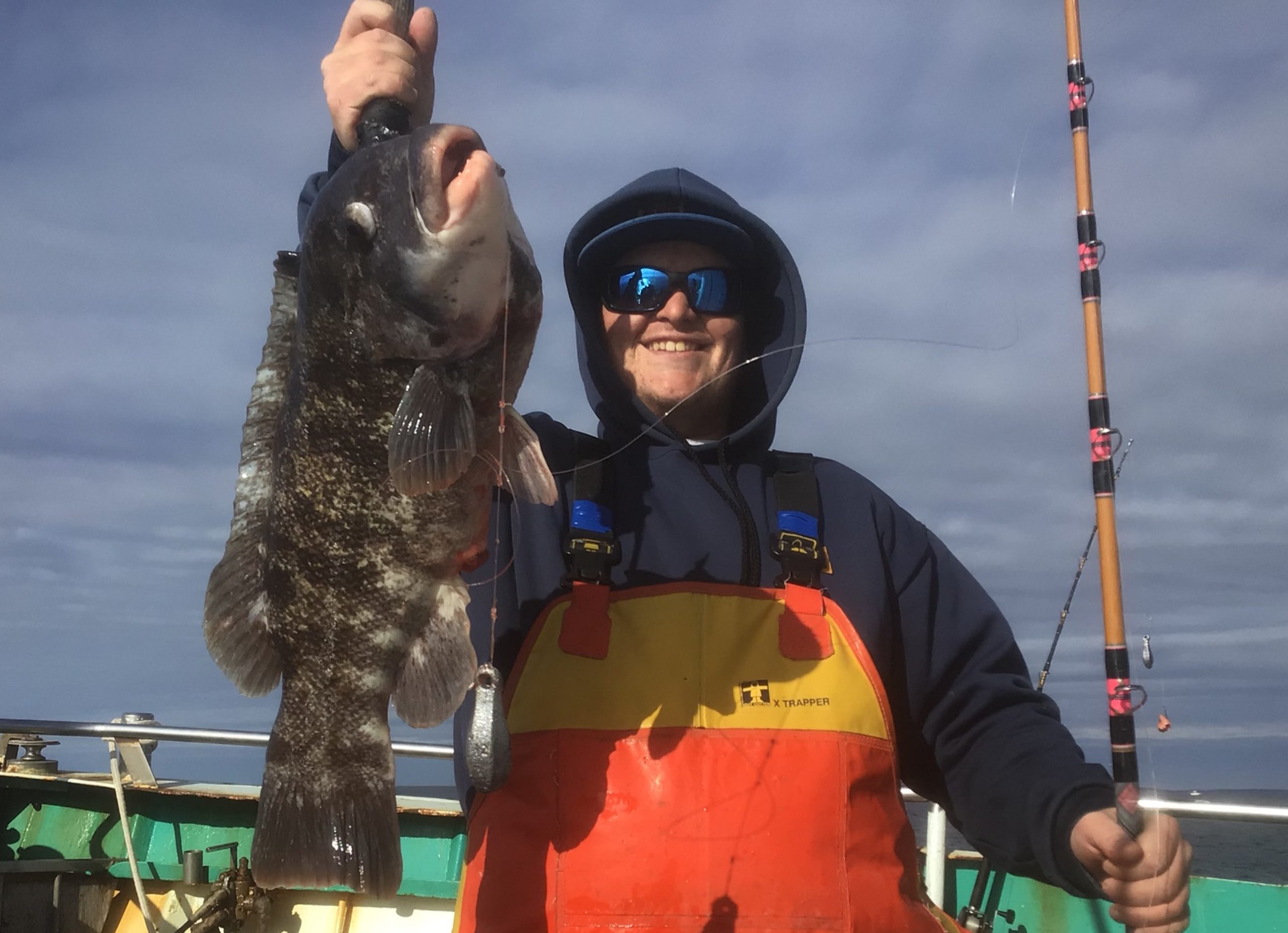 a person holding a pole in the snow