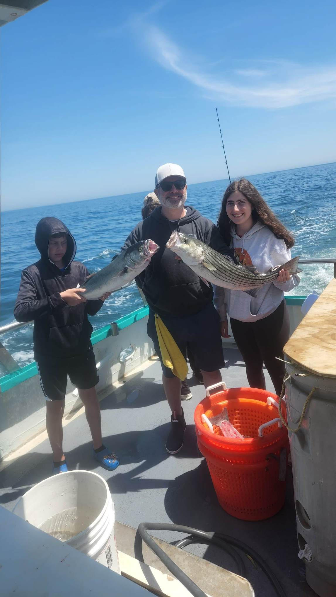 a couple of people that are standing in the water
