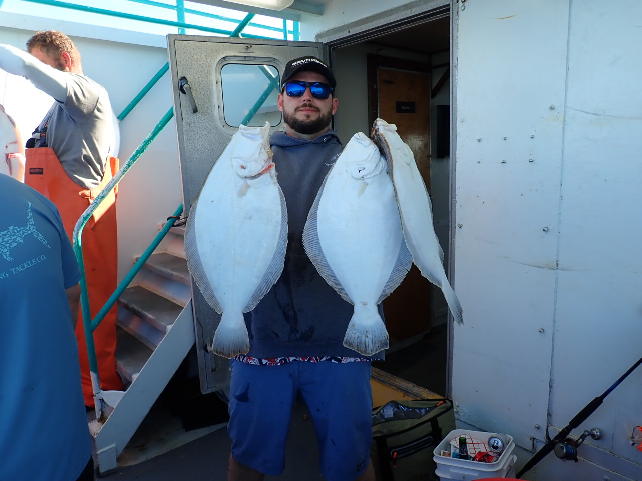 a person holding a fish