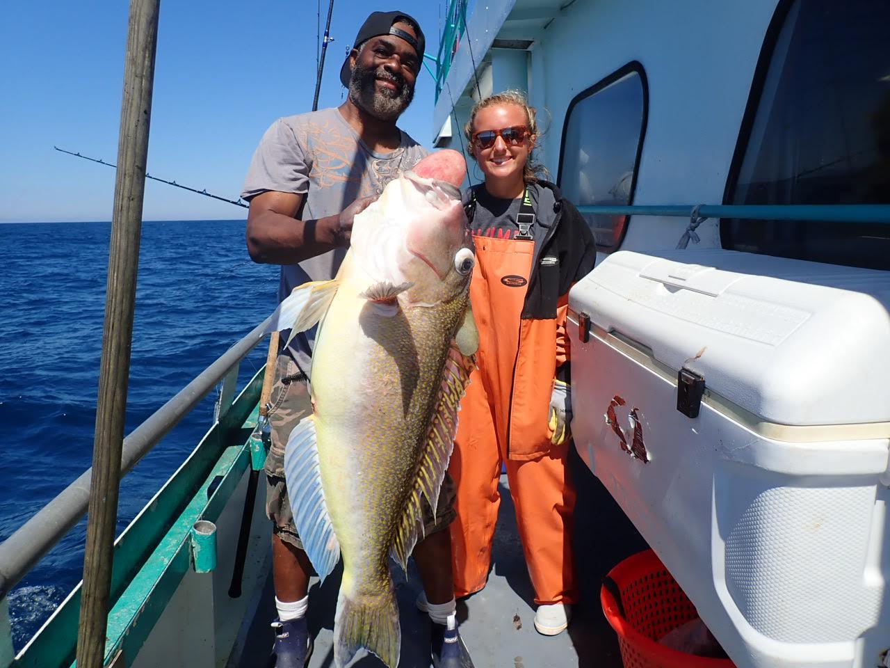 George Clinton riding on the back of a boat