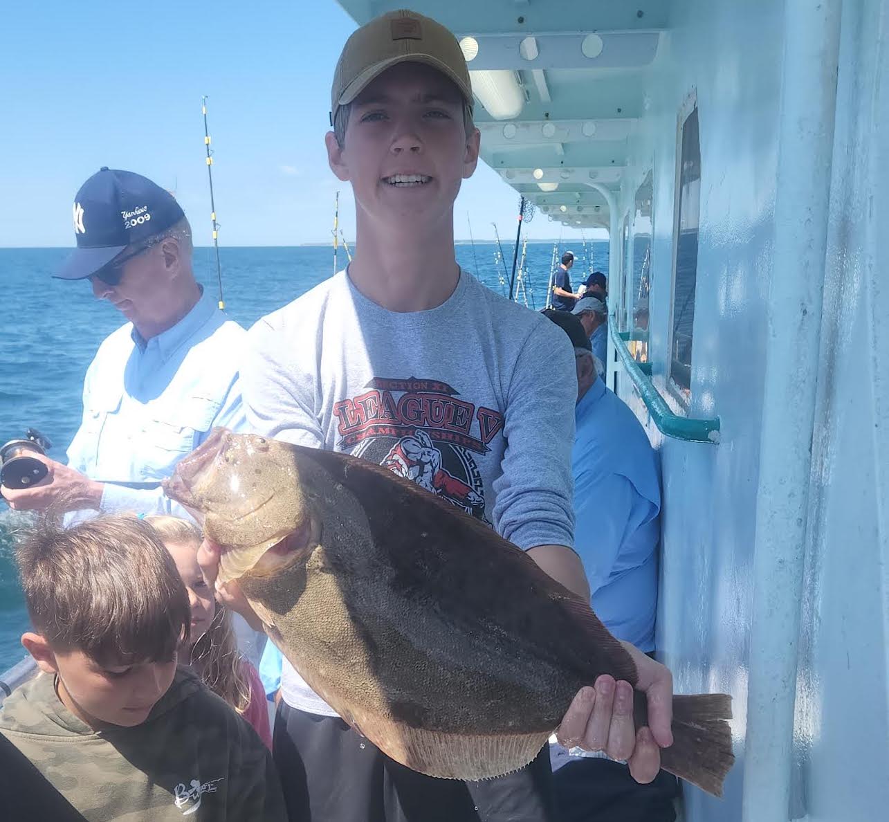 a person holding a fish