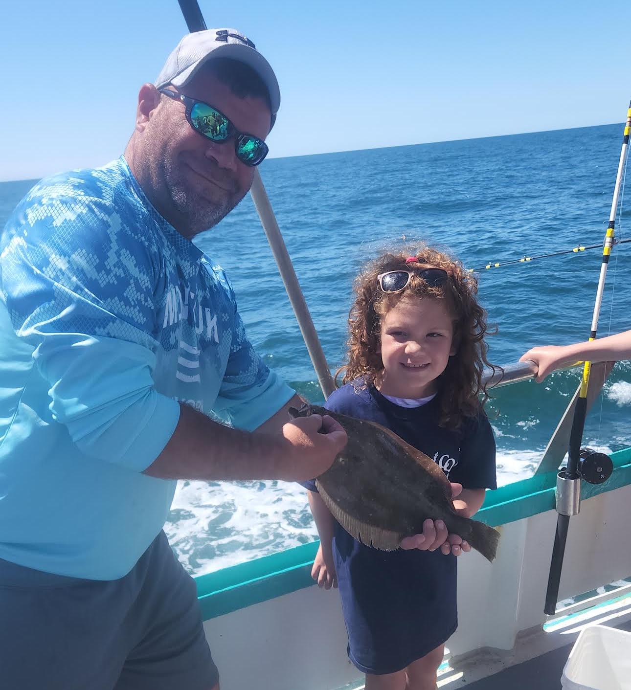a person standing on a boat in the water