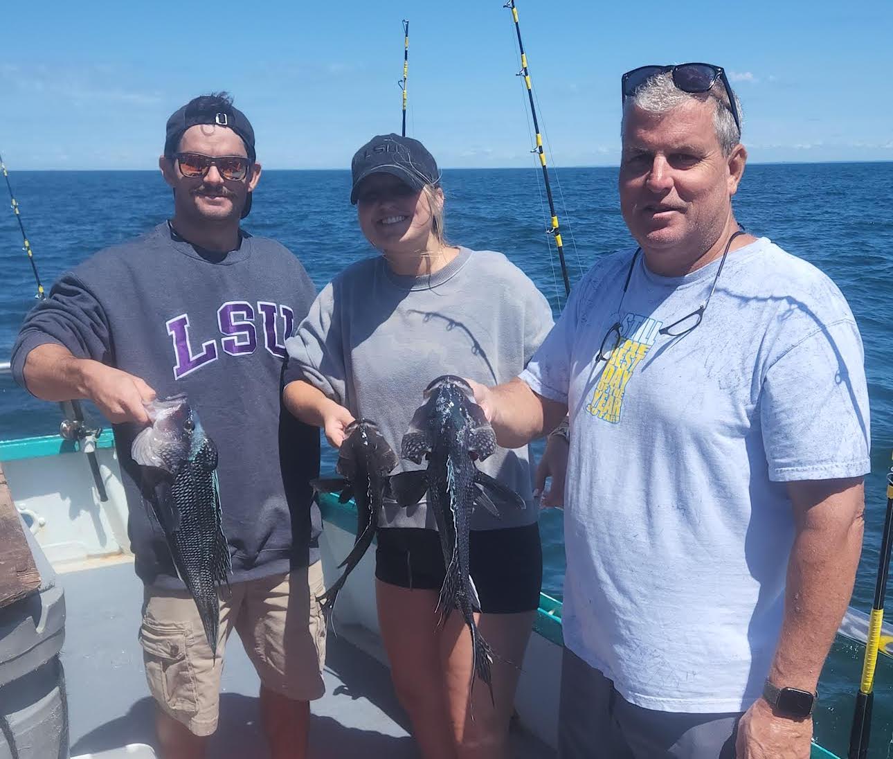 a couple of people that are standing in the water