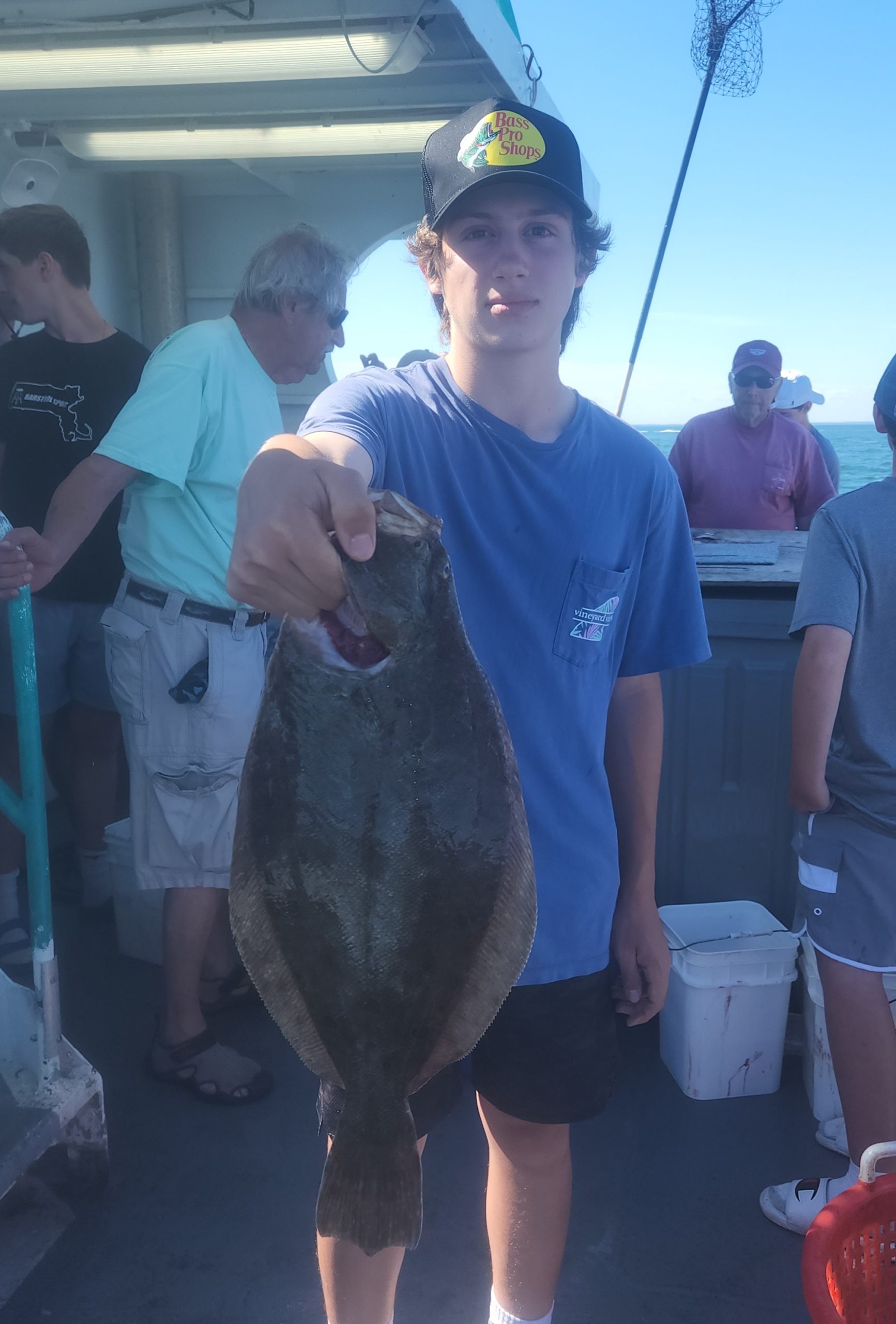 a person holding a fish