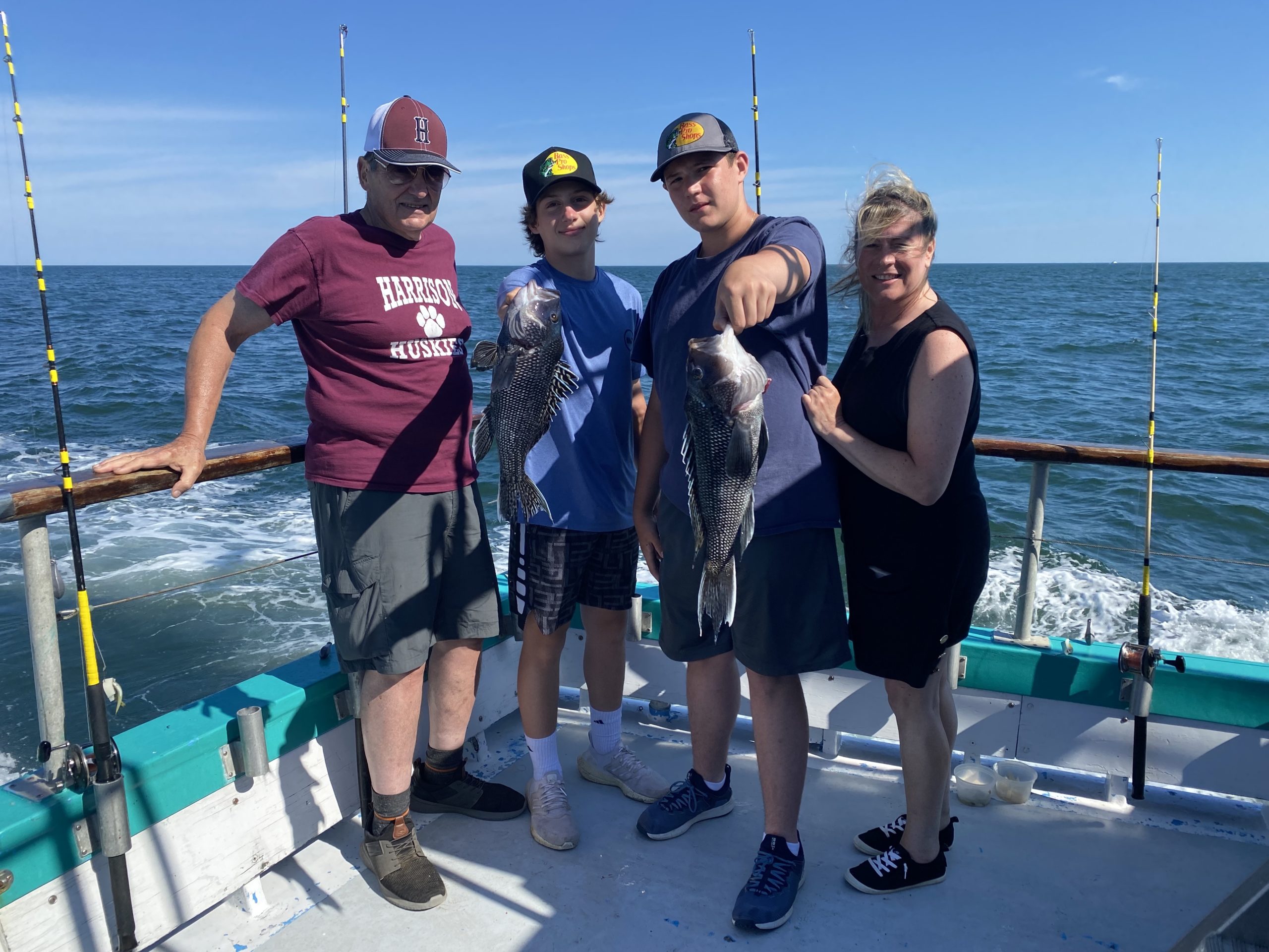 a group of people standing in the water