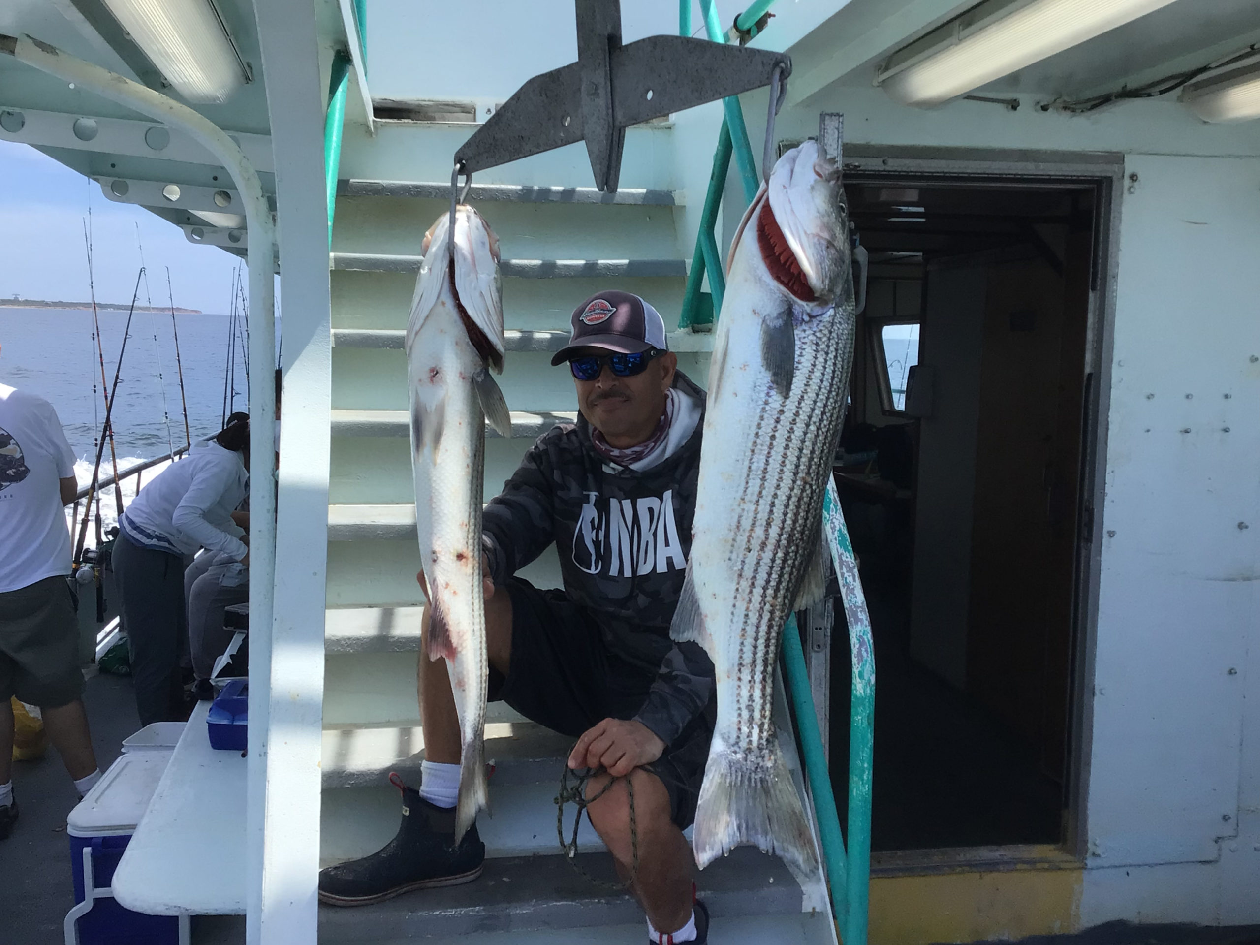 a person holding a fish