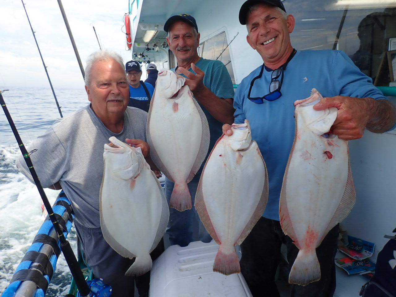 a man holding a fish