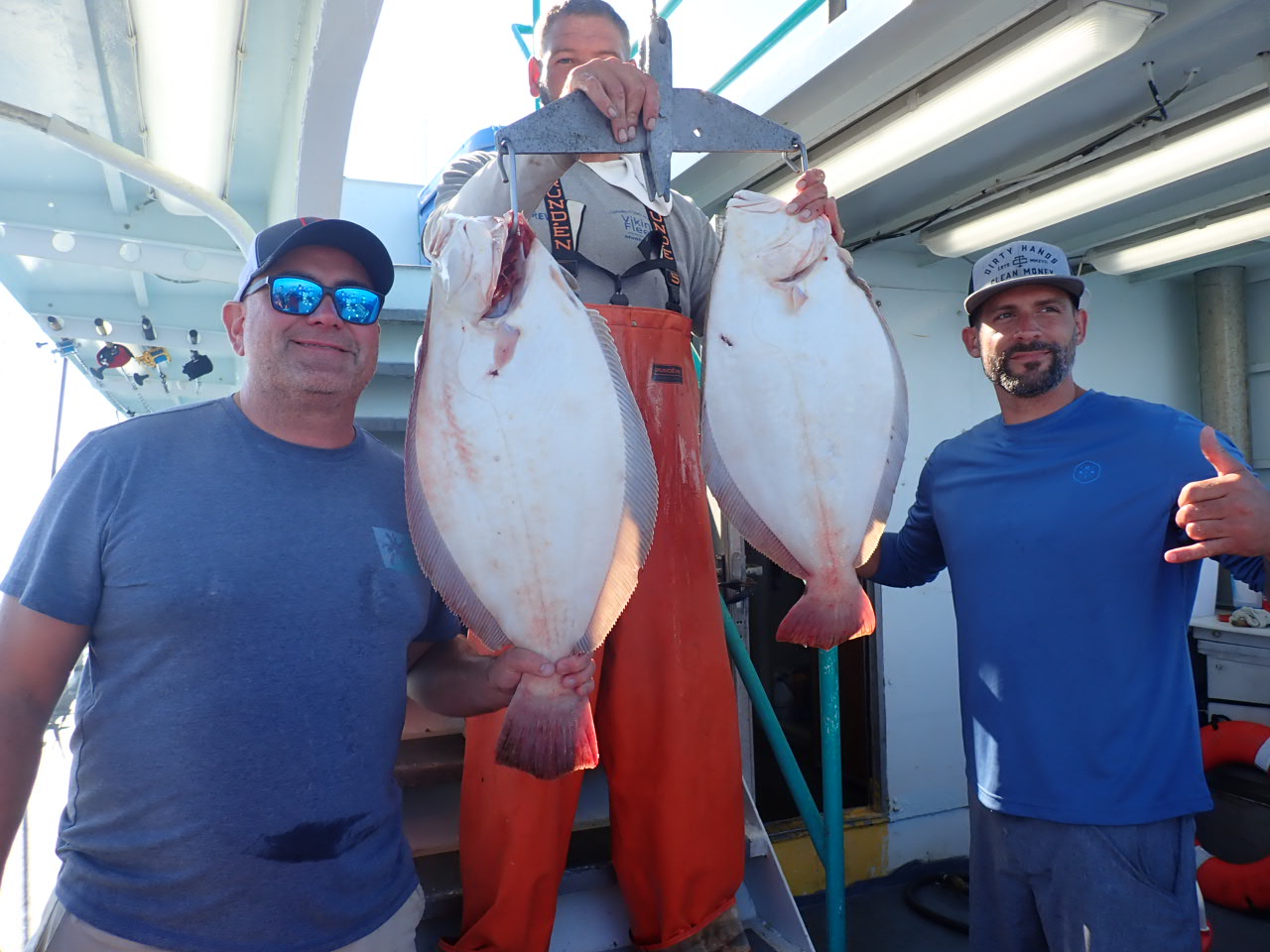 a man holding a fish