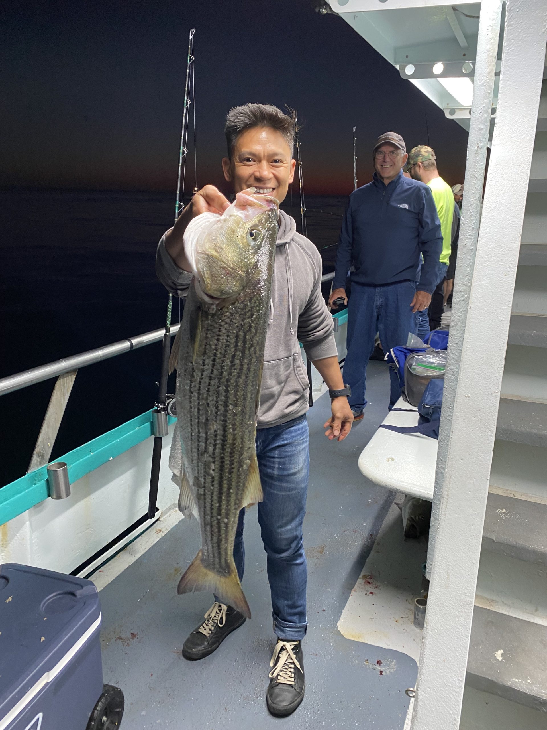 a man standing next to a woman