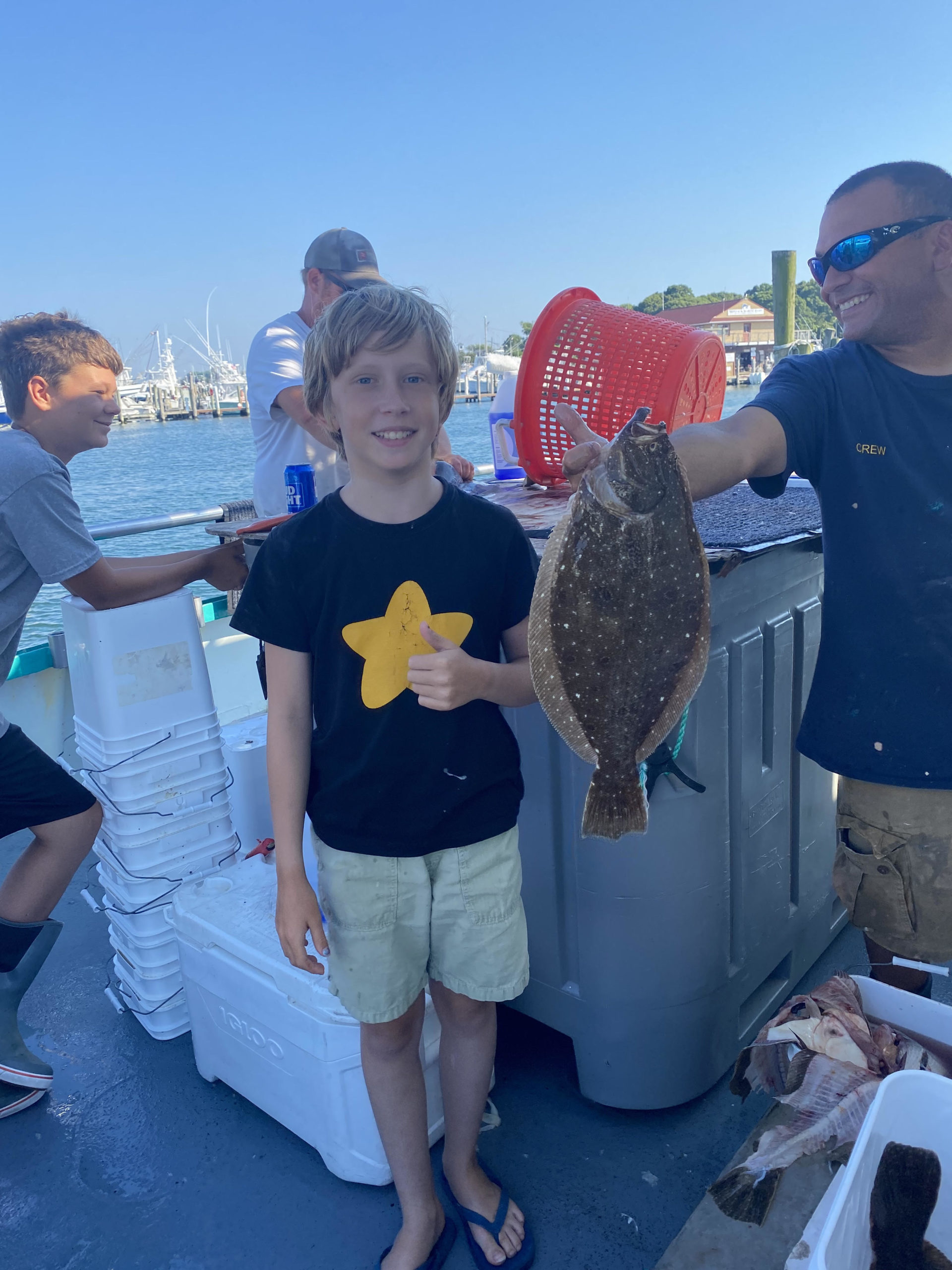 a man holding a fish