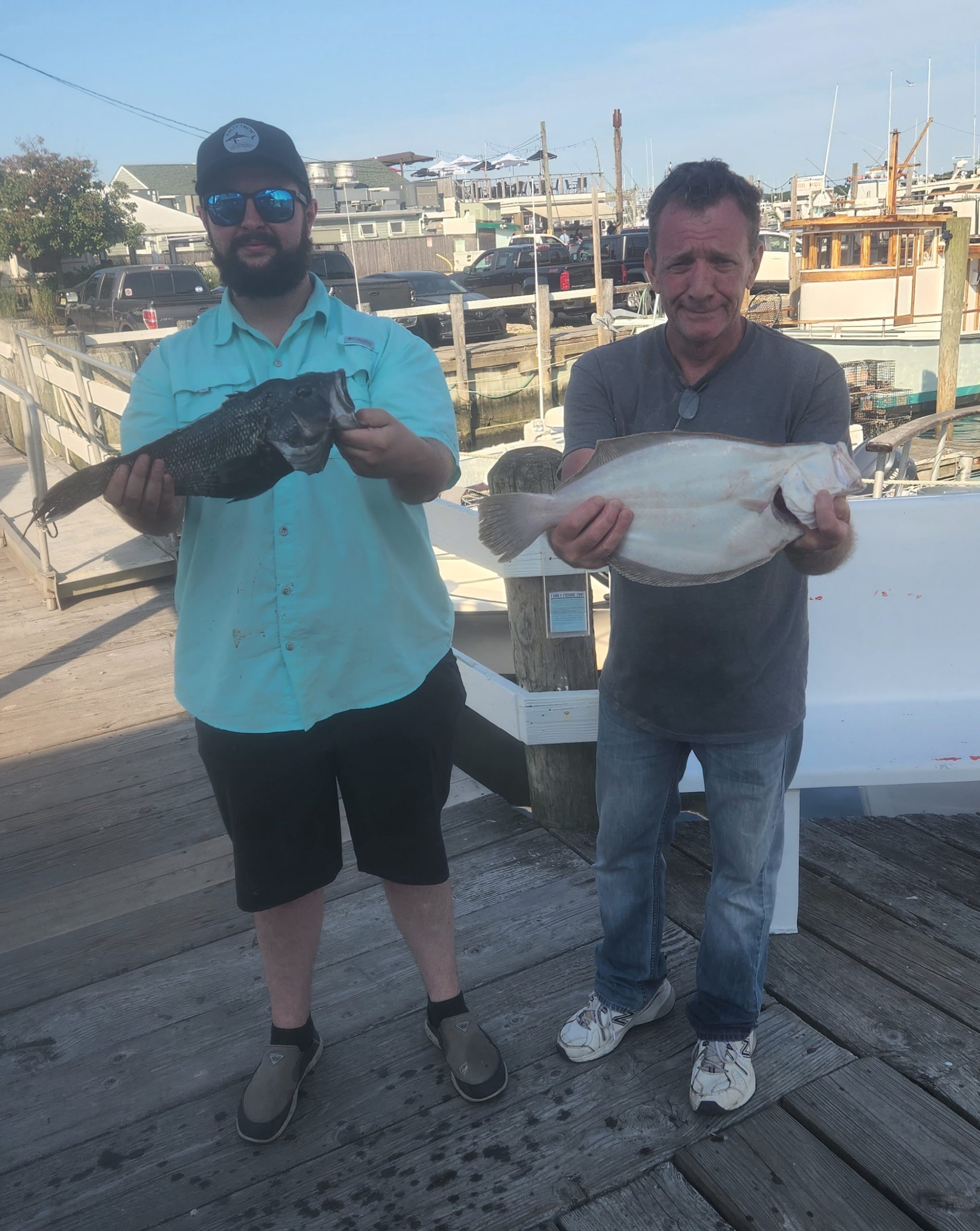 a person holding a fish