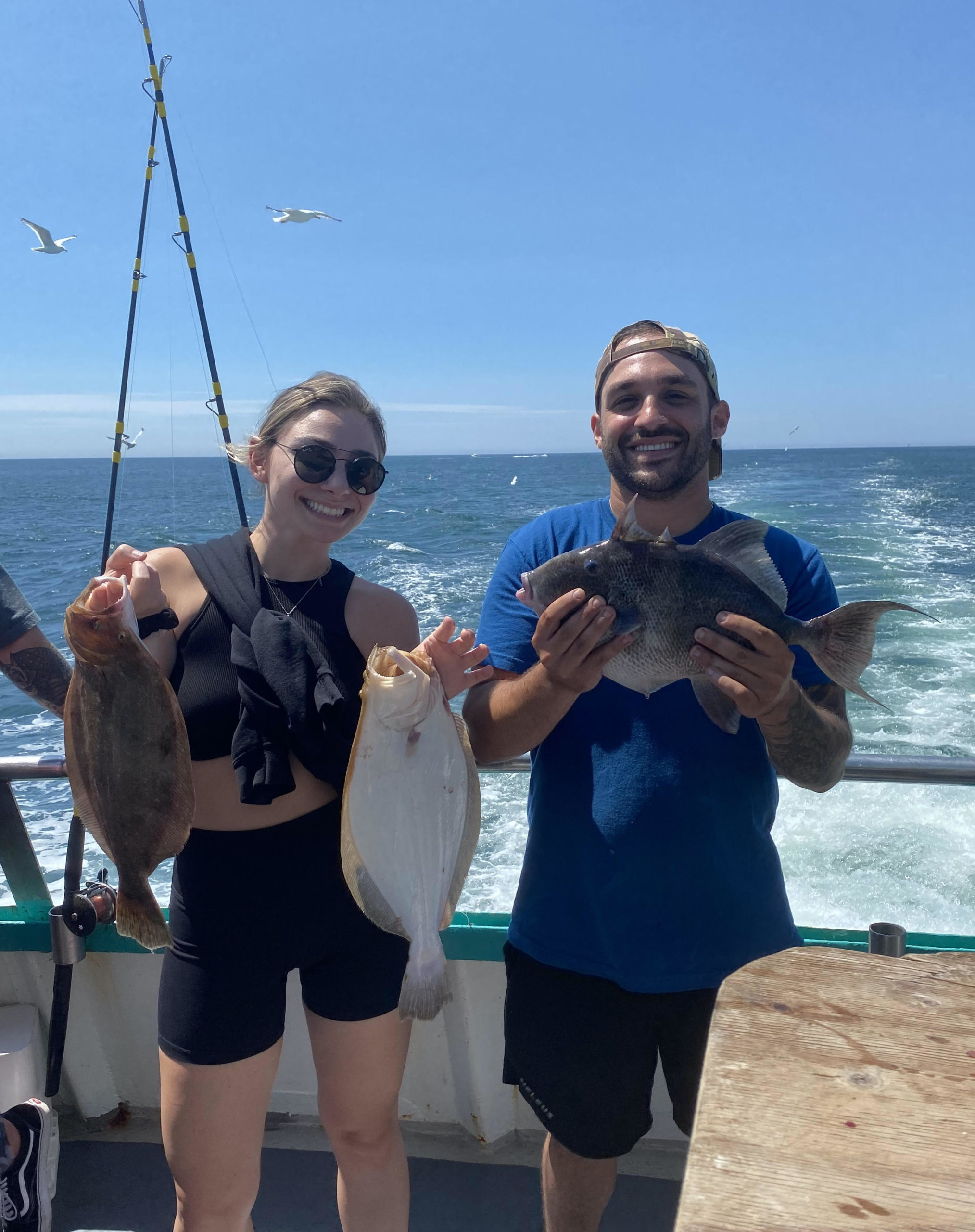 a person standing next to a body of water