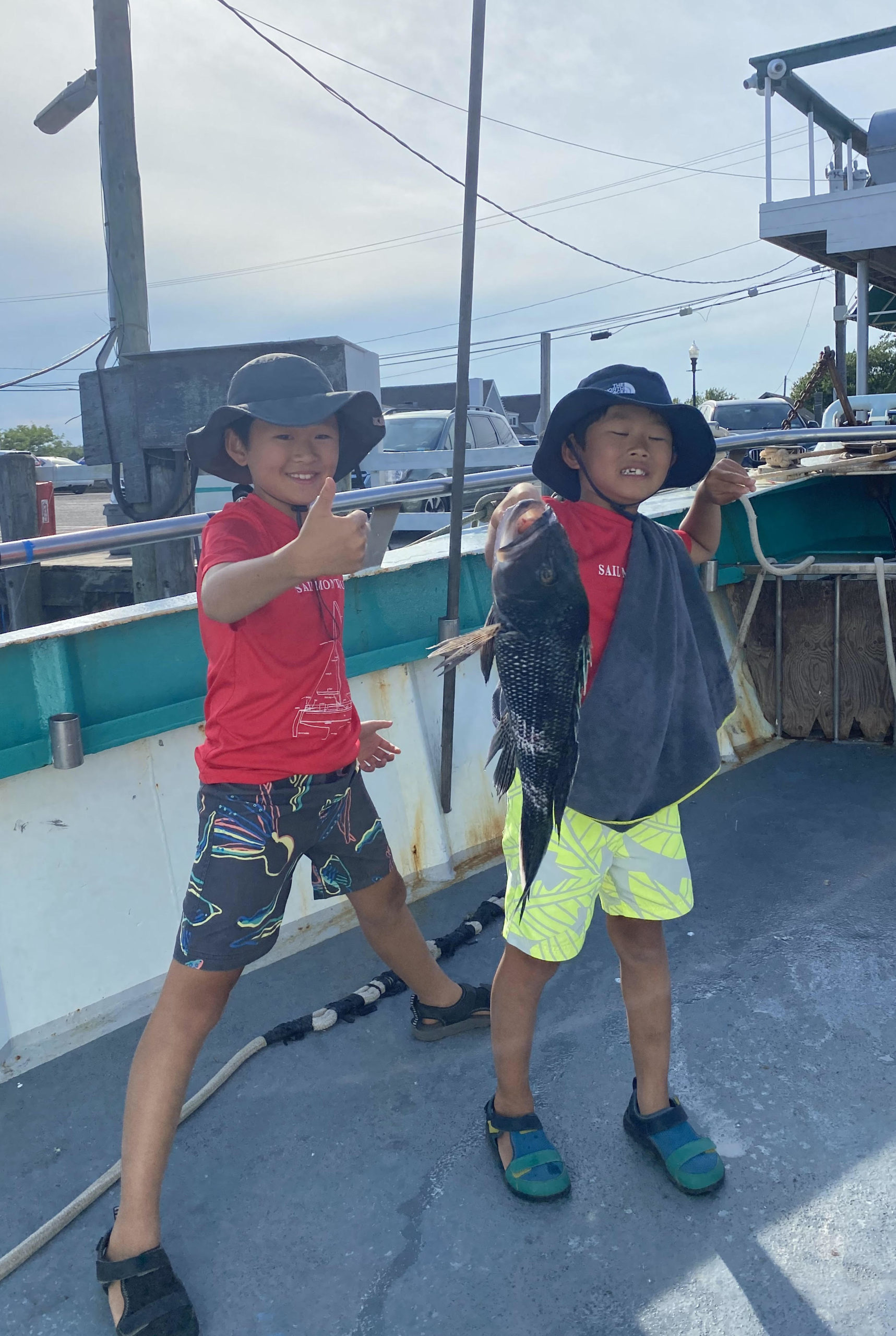 a young boy holding a baseball bat