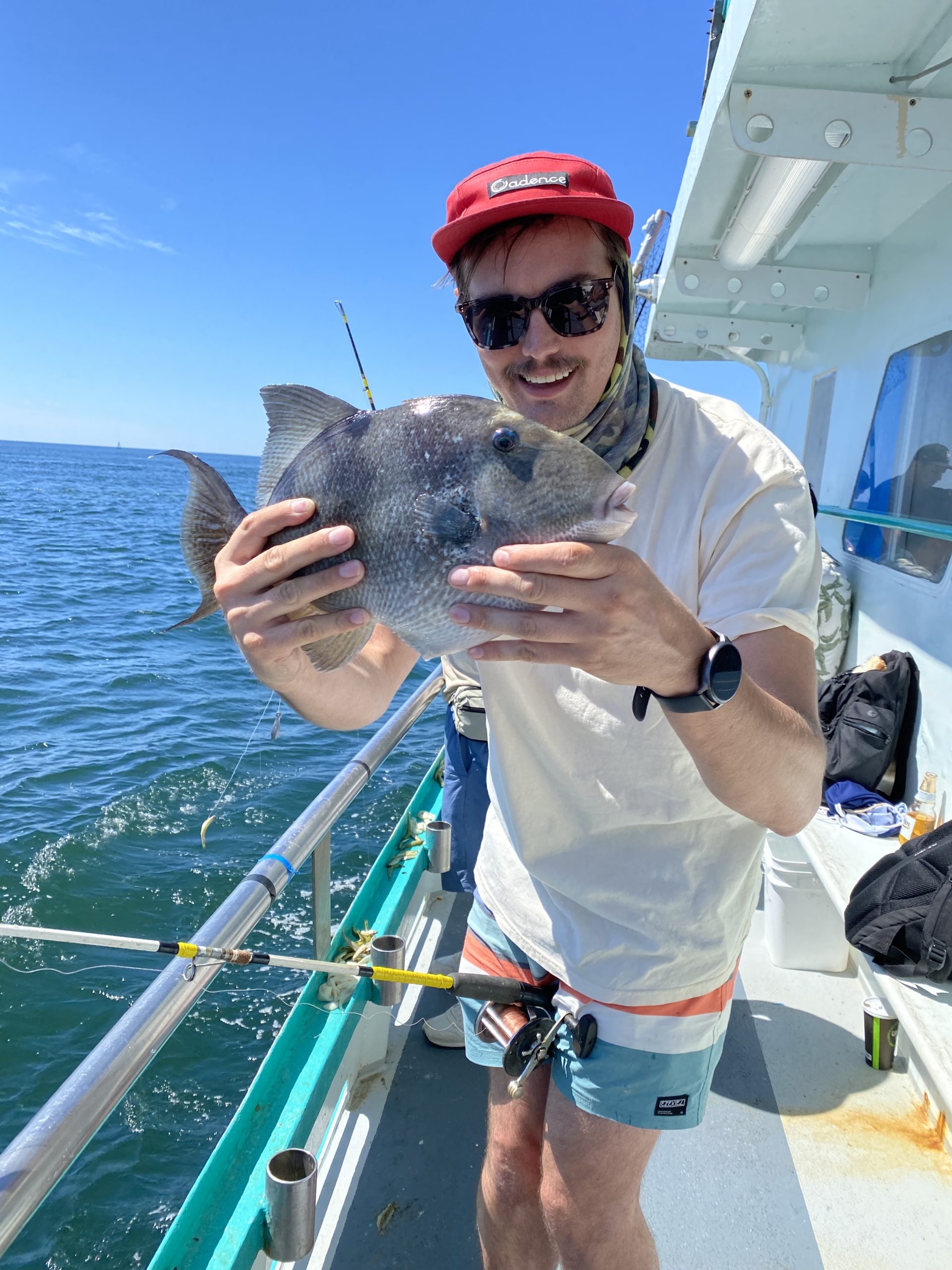 a man standing on a boat in the water