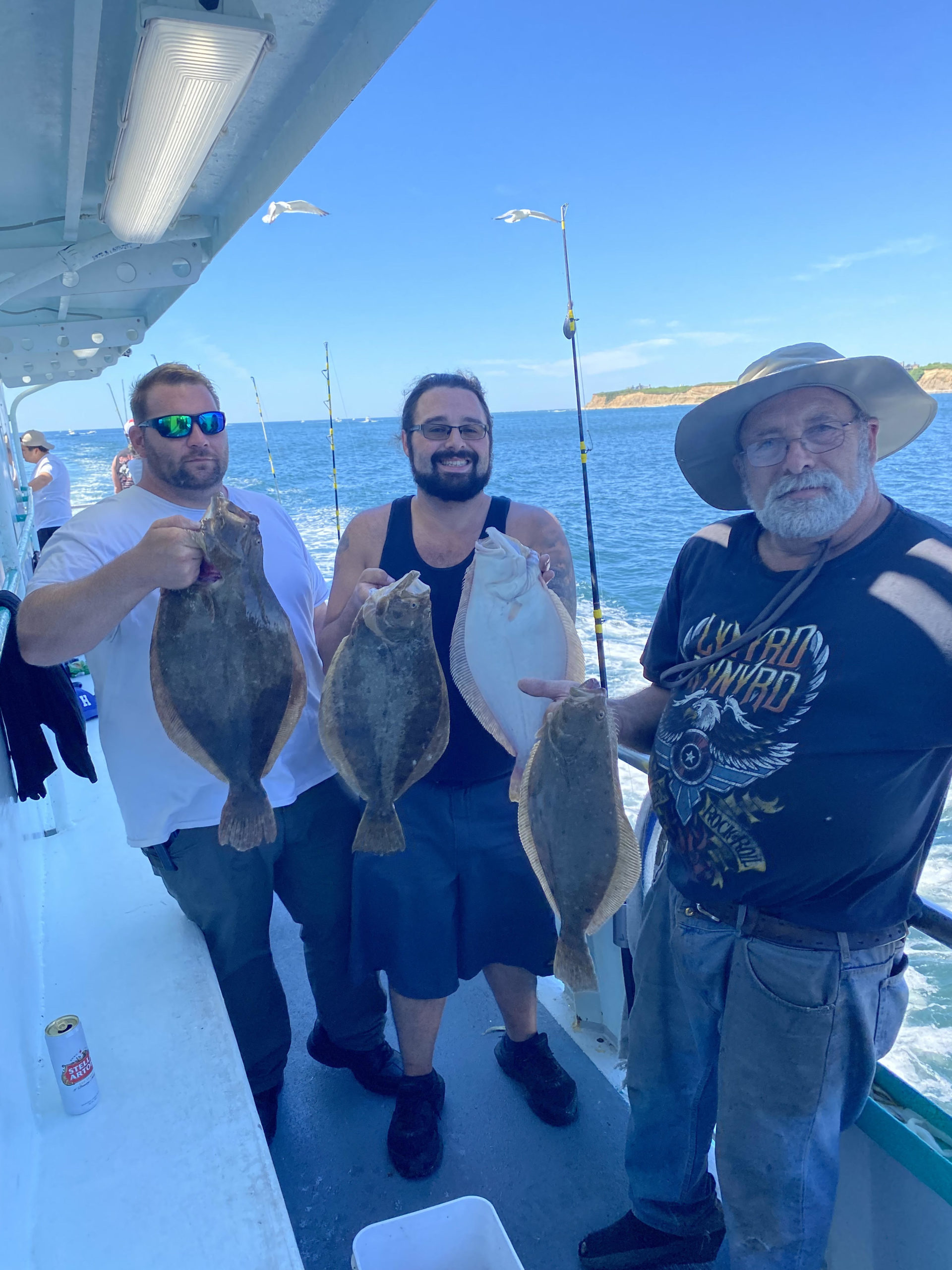 a man holding a fish