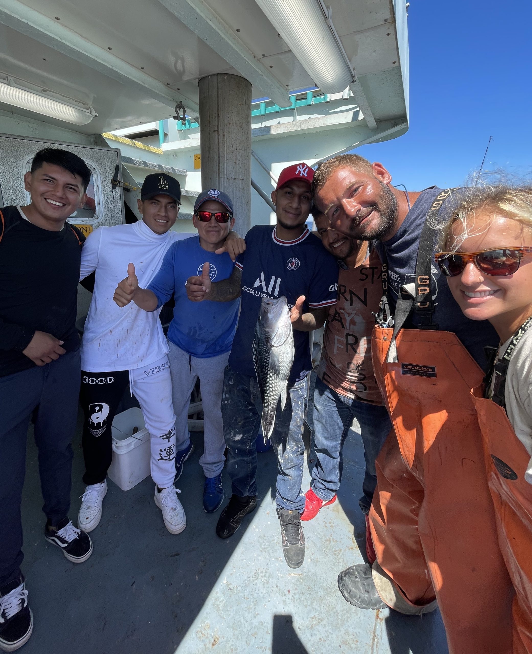 a group of people posing for the camera