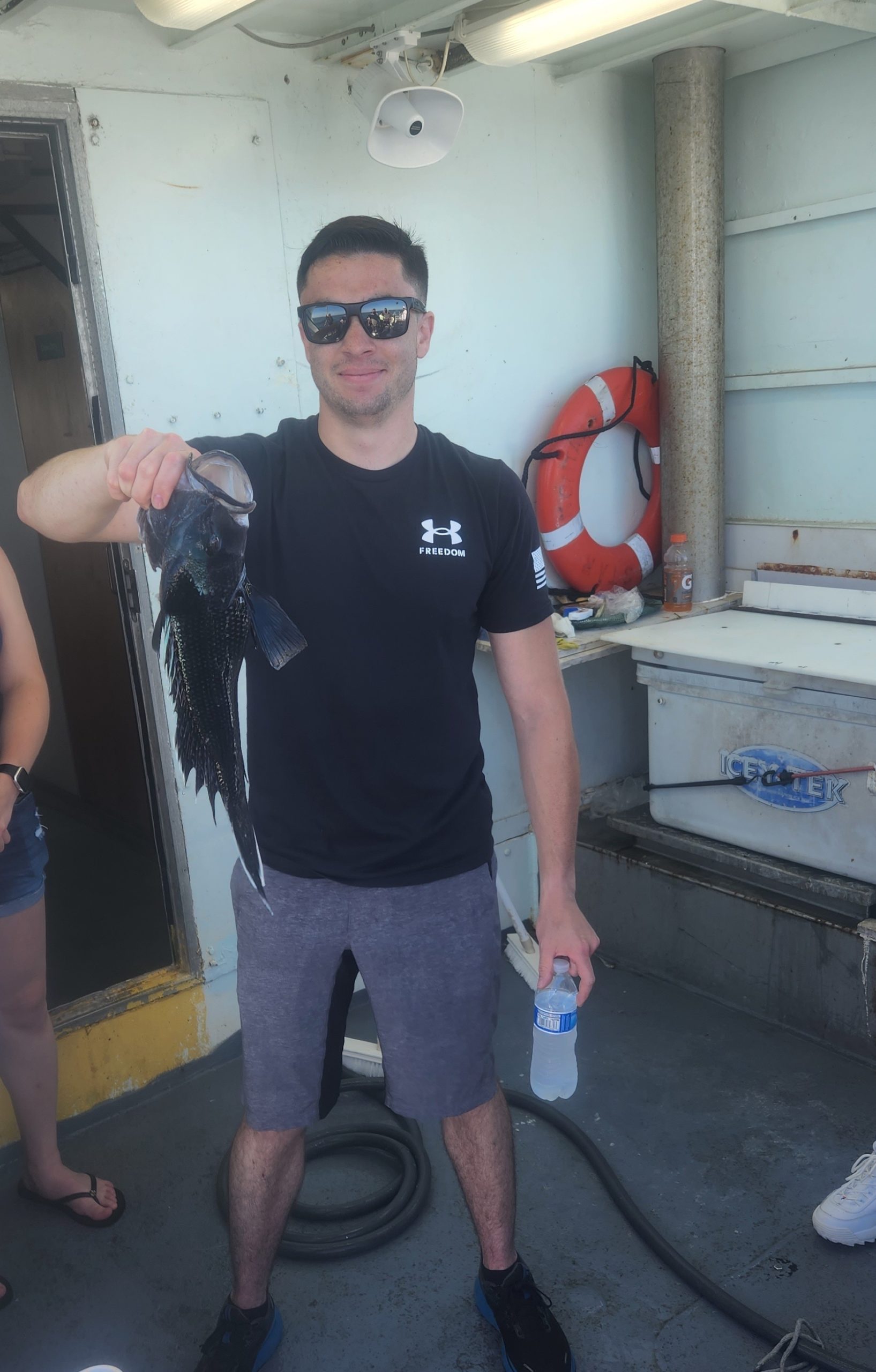 a person standing posing for the camera