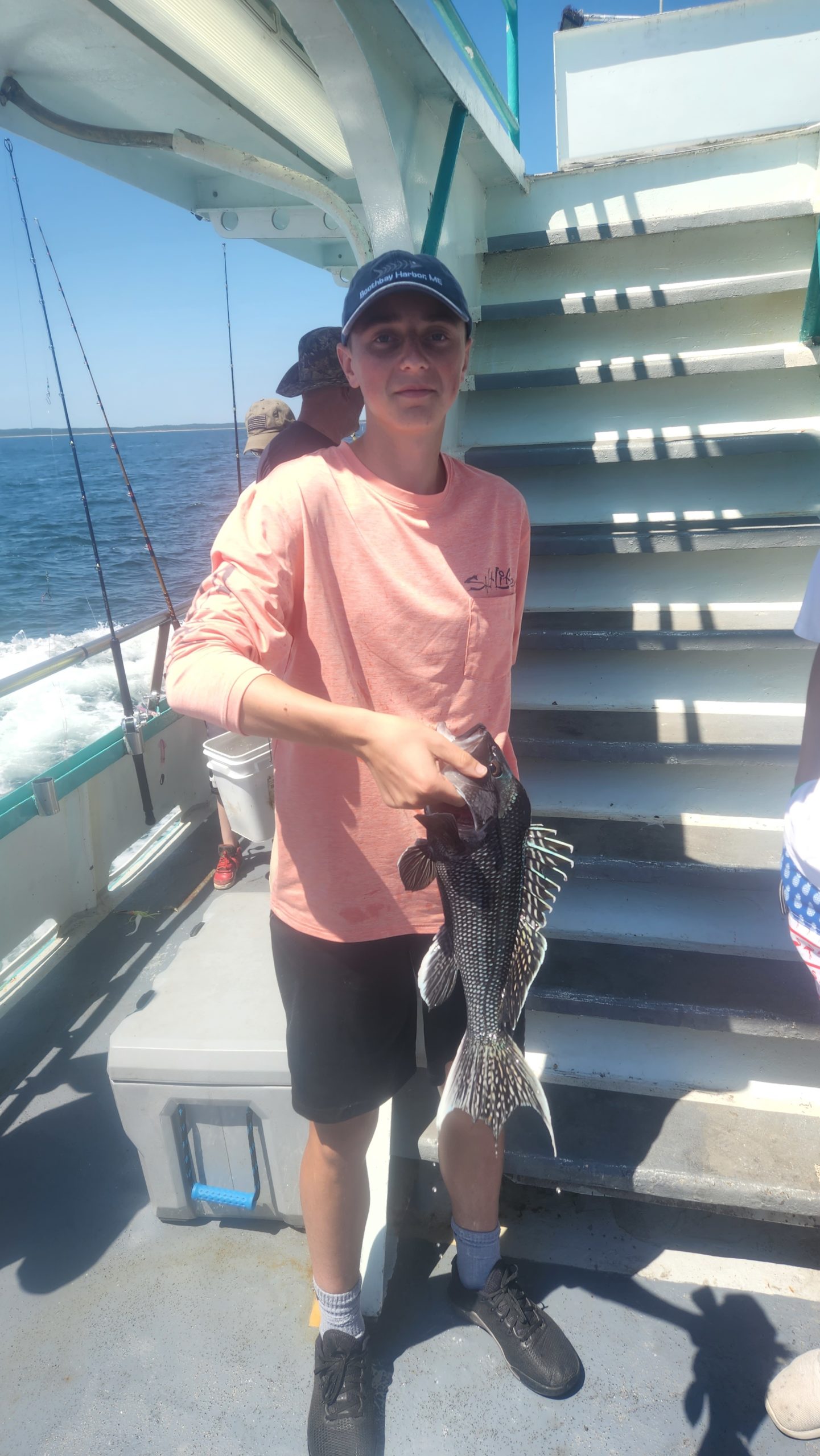 a person holding a fish