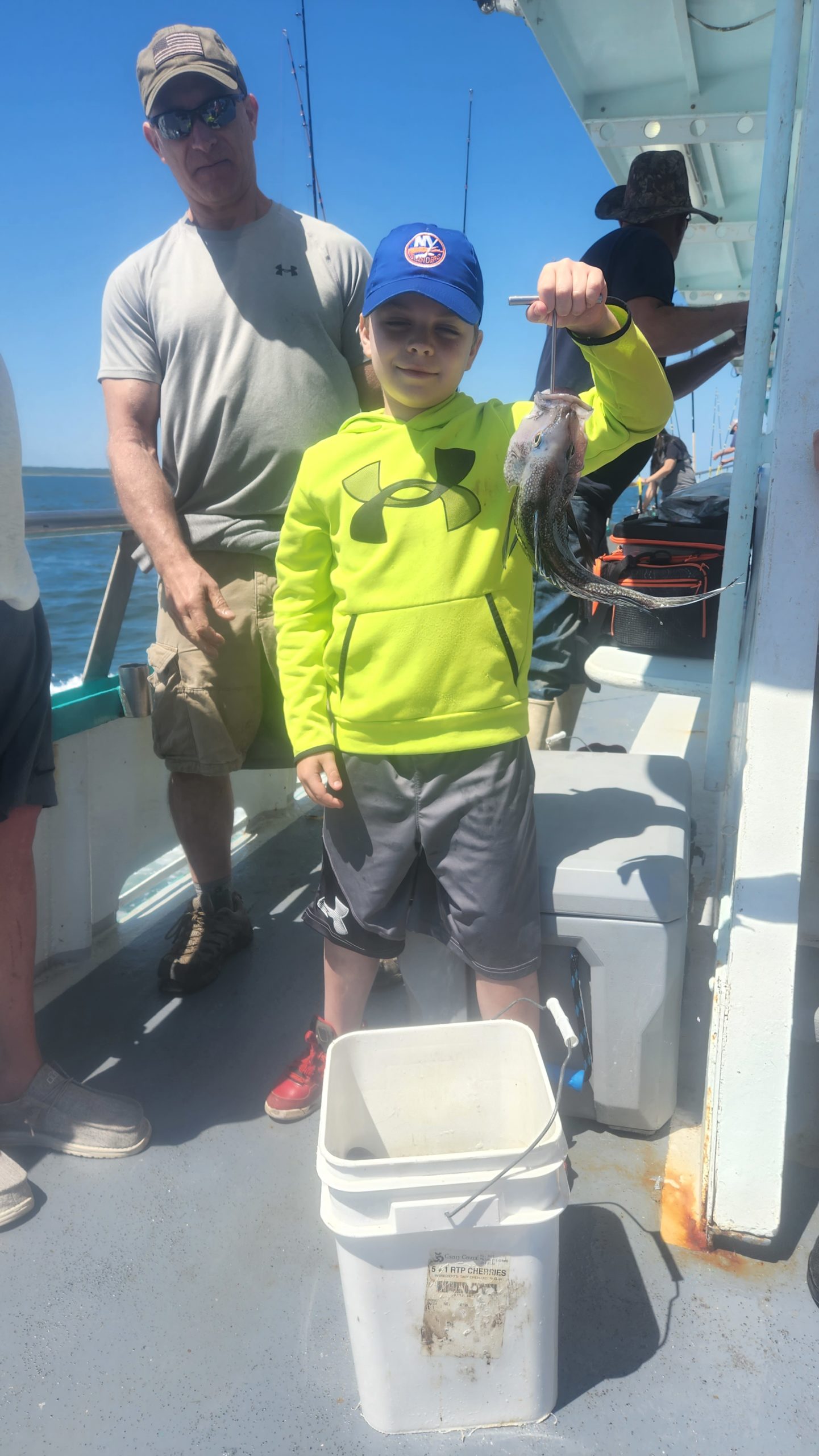 a man standing next to luggage