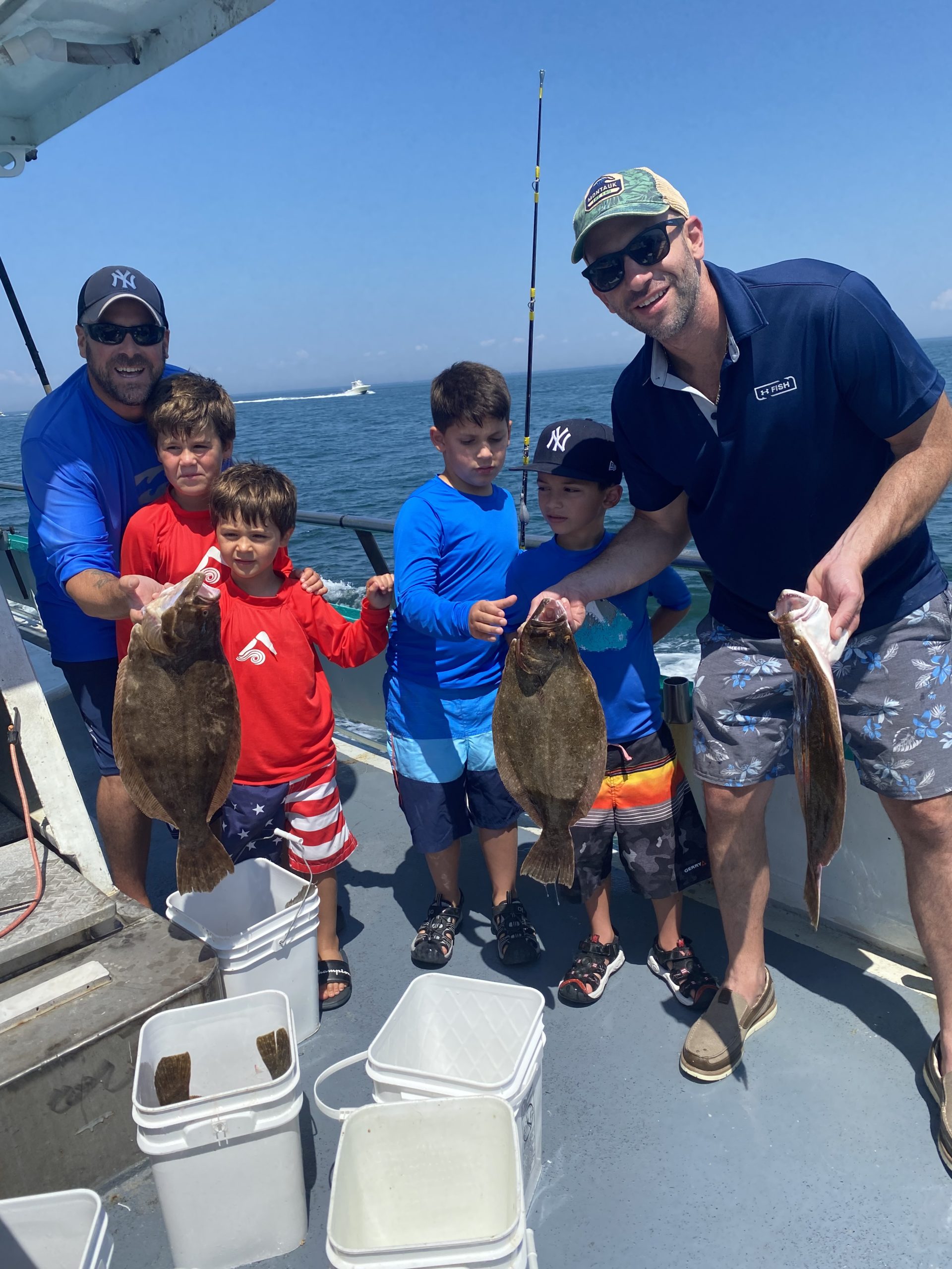 a group of people standing on top of a ramp