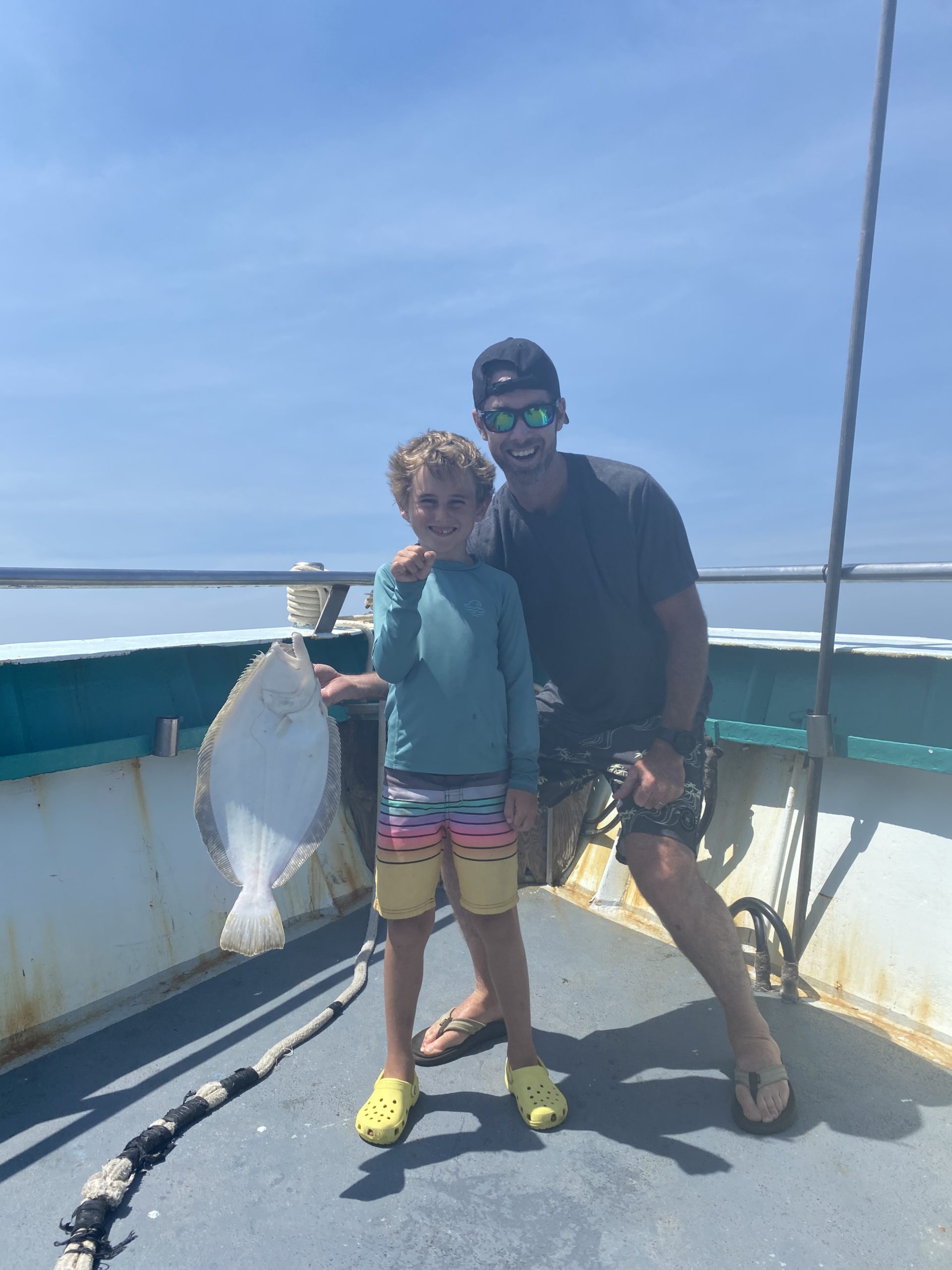 a couple of people that are standing in the water