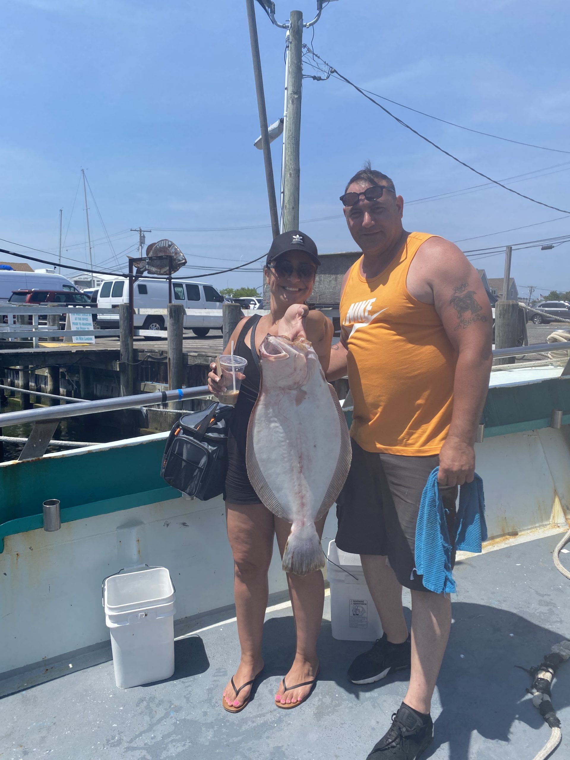 a person holding a fish