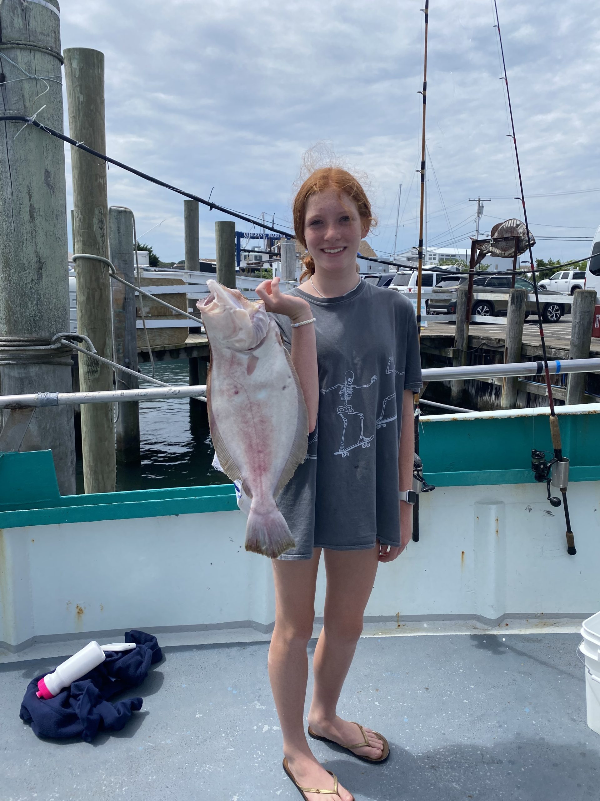 a person holding a fish
