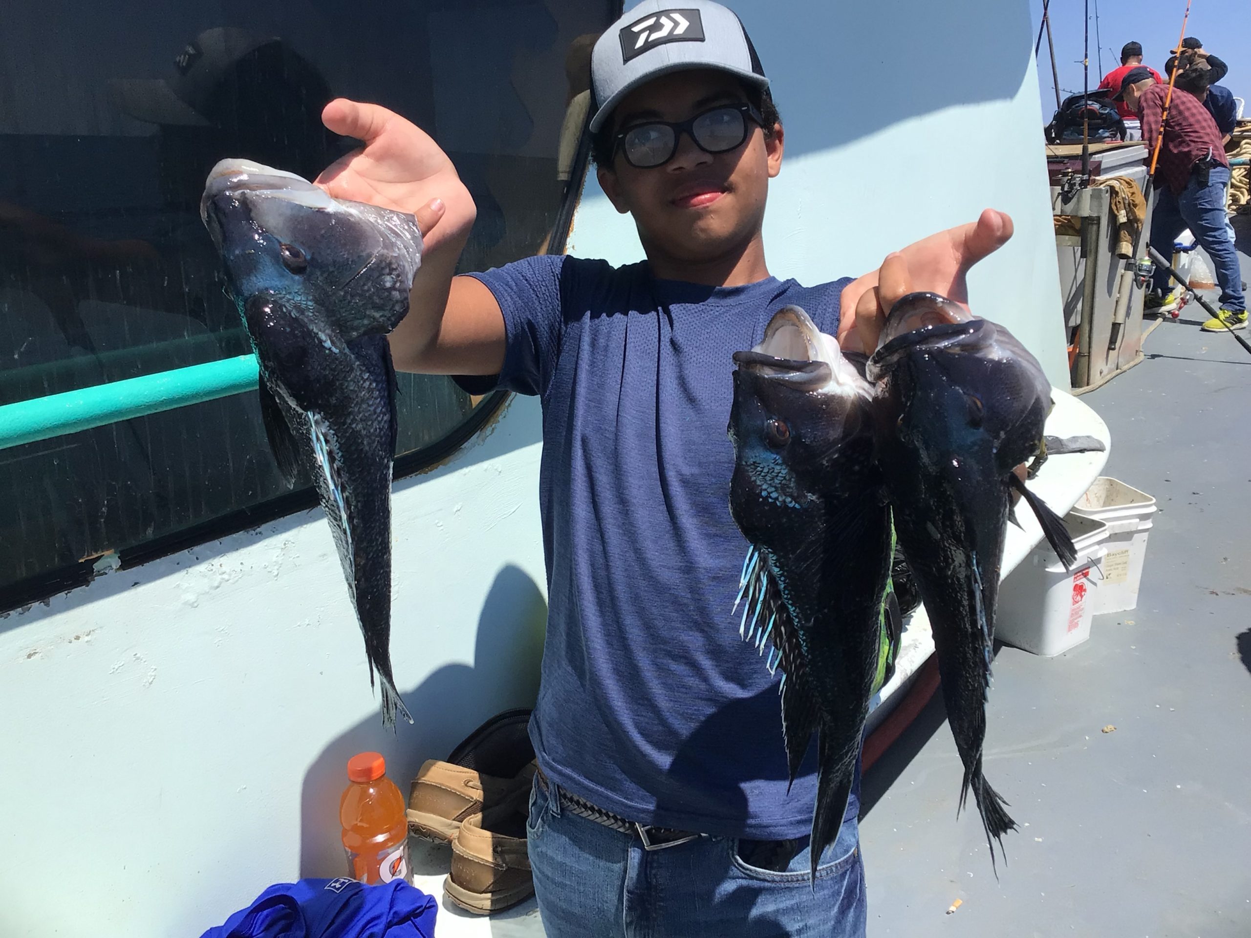 a person holding a fish