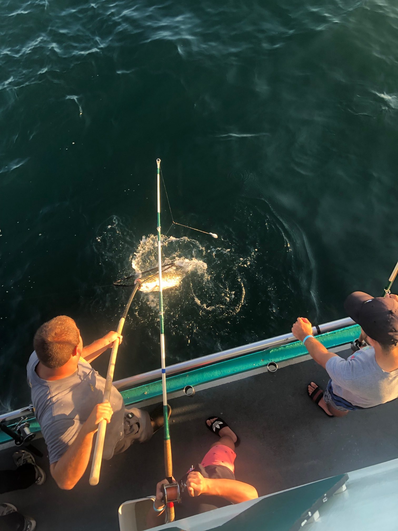 a group of people on a boat in the water