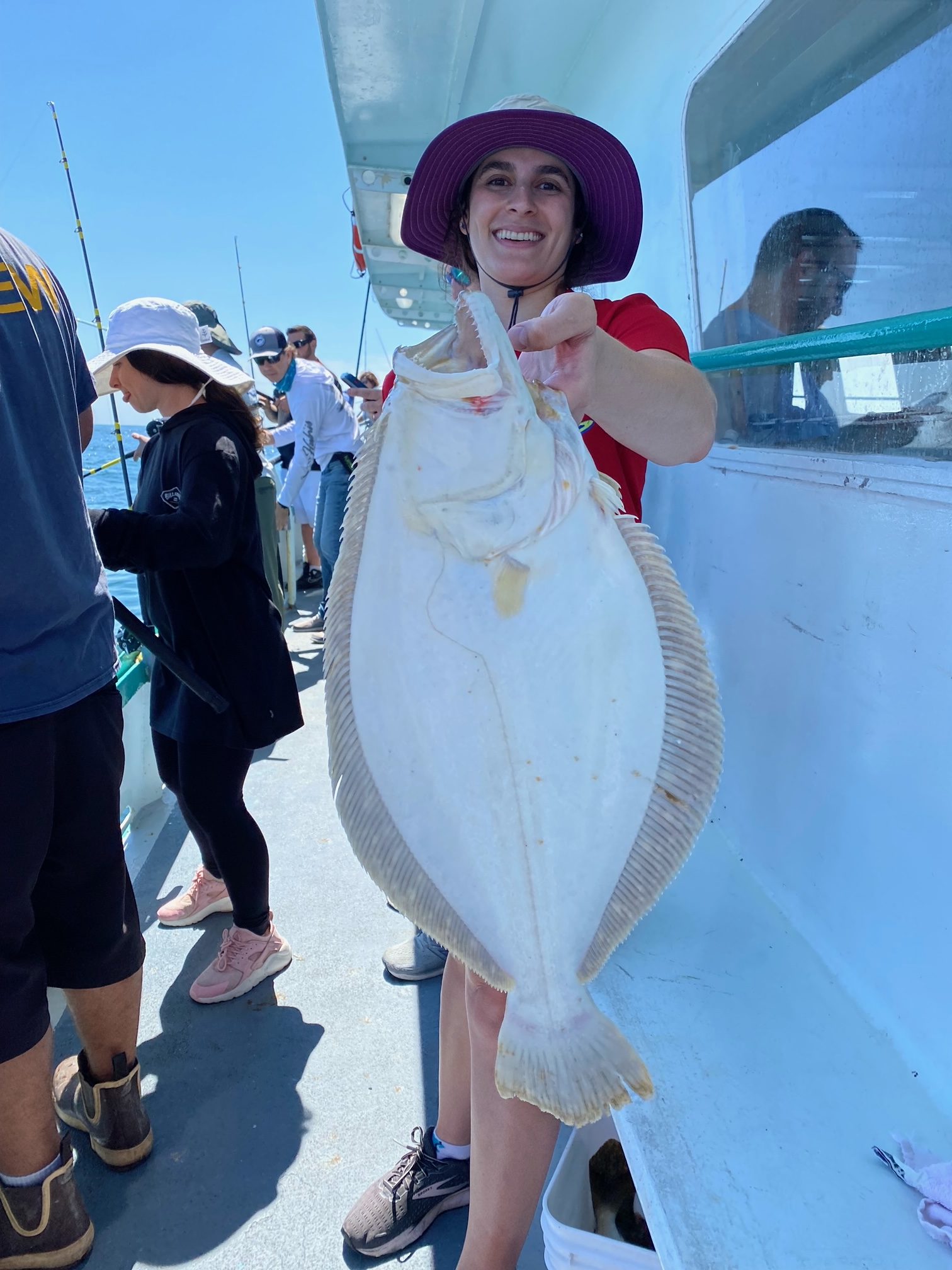 a person holding a fish