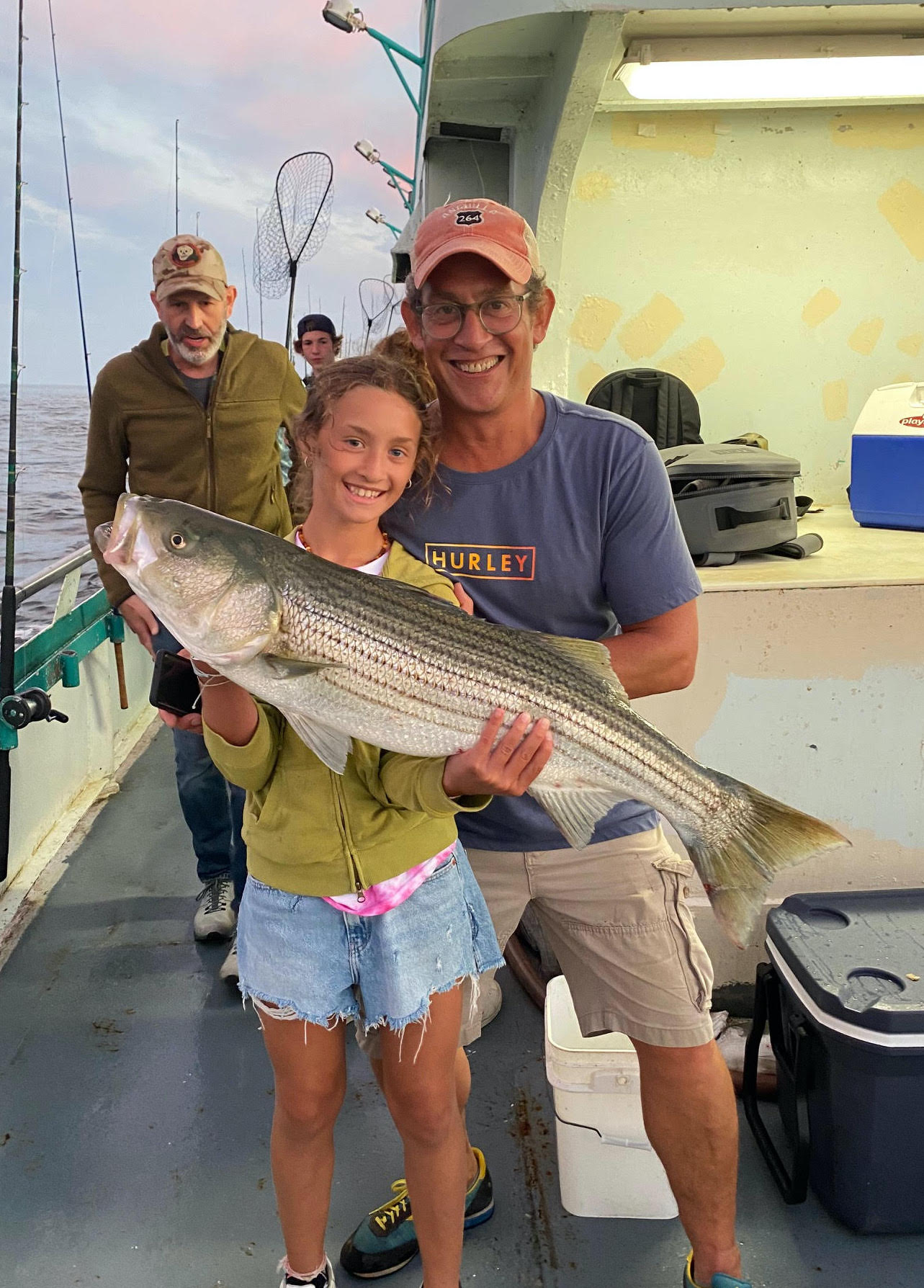 a man holding a fish