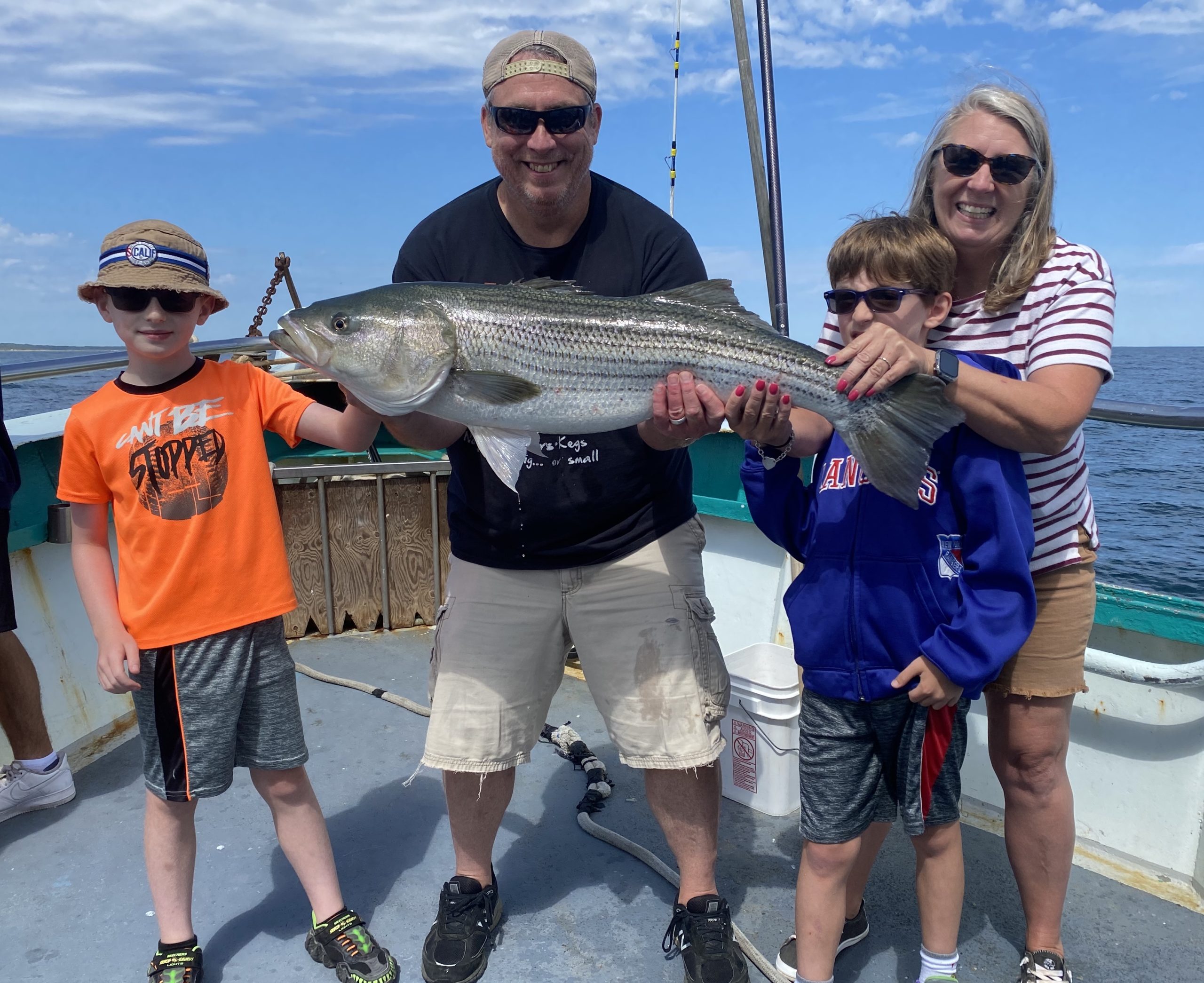 a man holding a fish