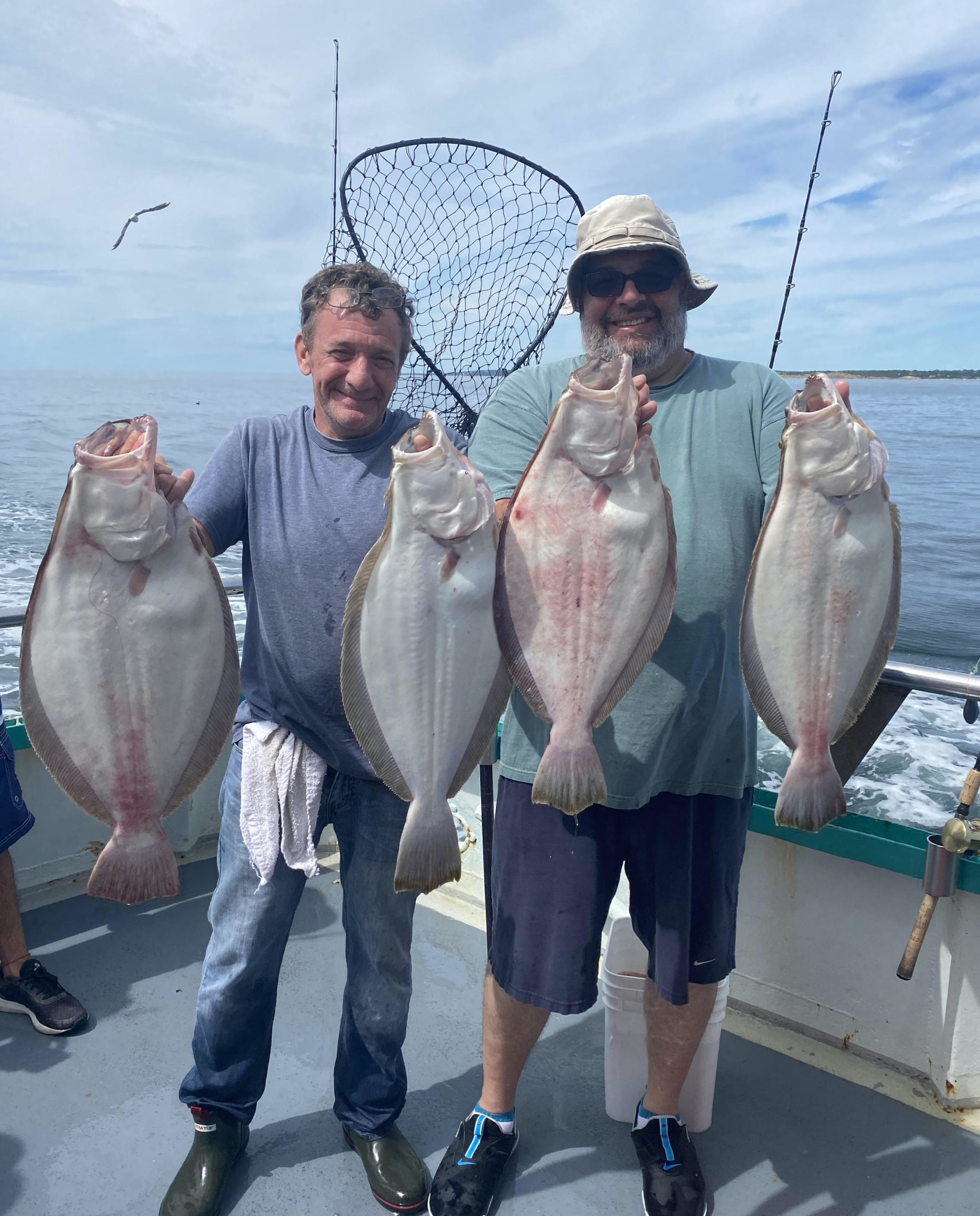 a person holding a fish