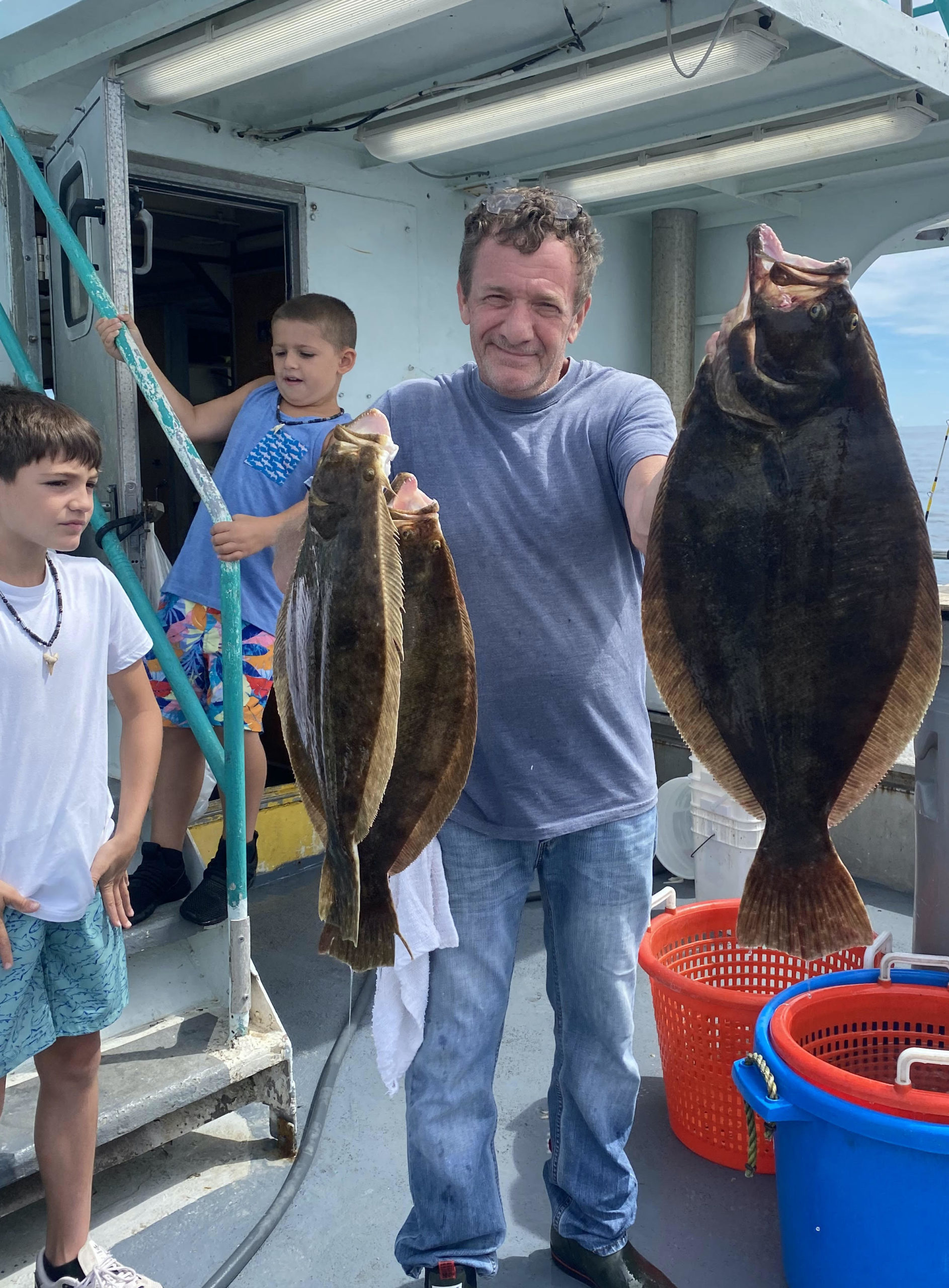 a man holding a fish