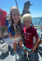 a little girl posing for a picture