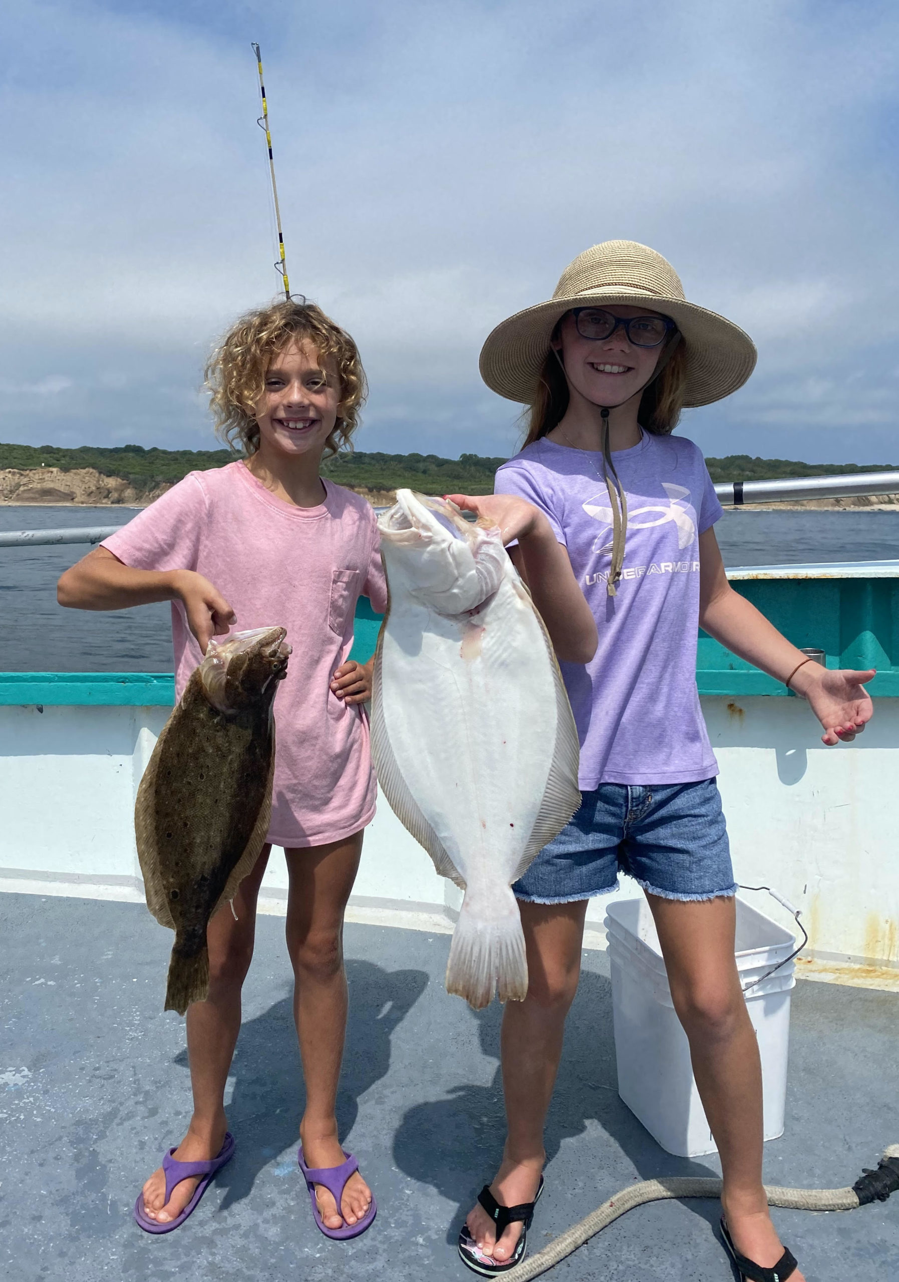 a little girl that is standing in the water