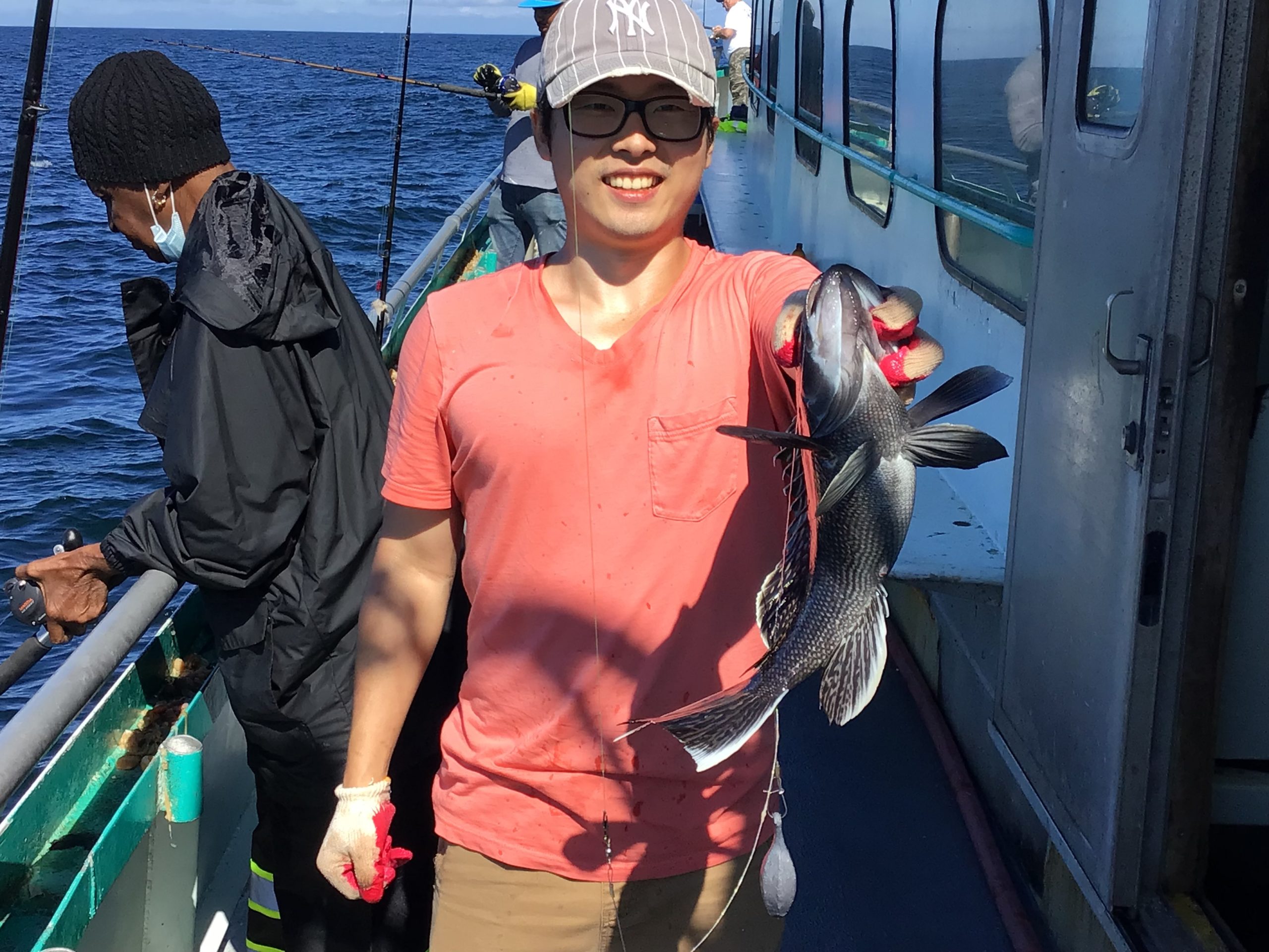 a person holding a fish