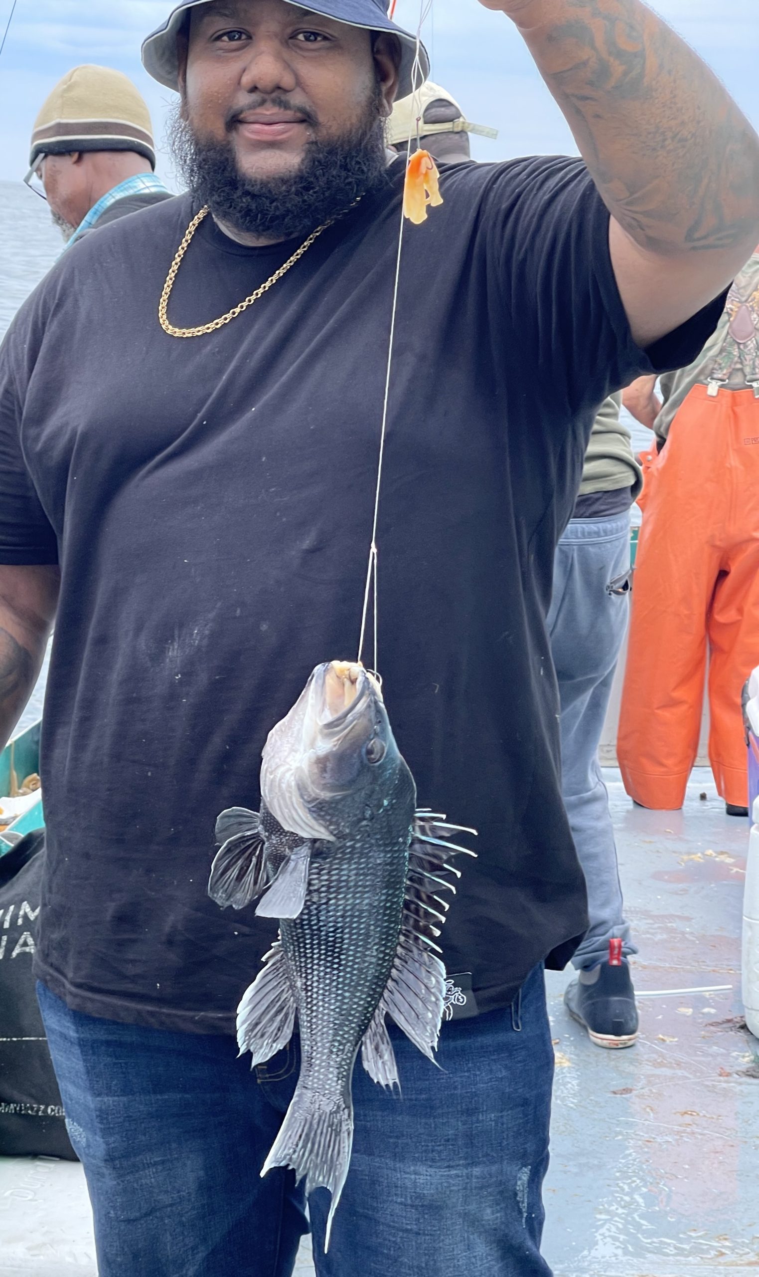 a man holding a fish