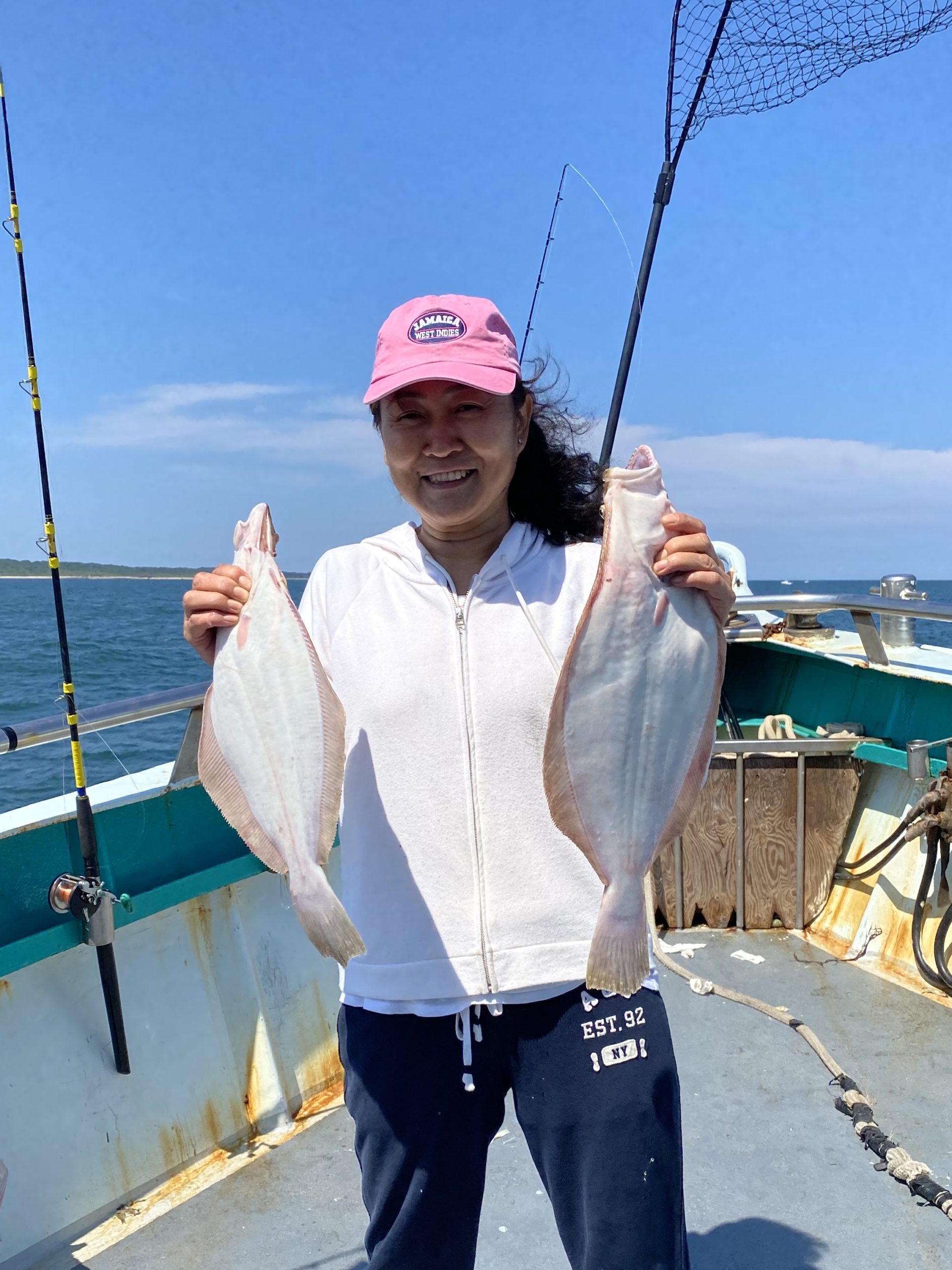 a person standing on a boat in the water