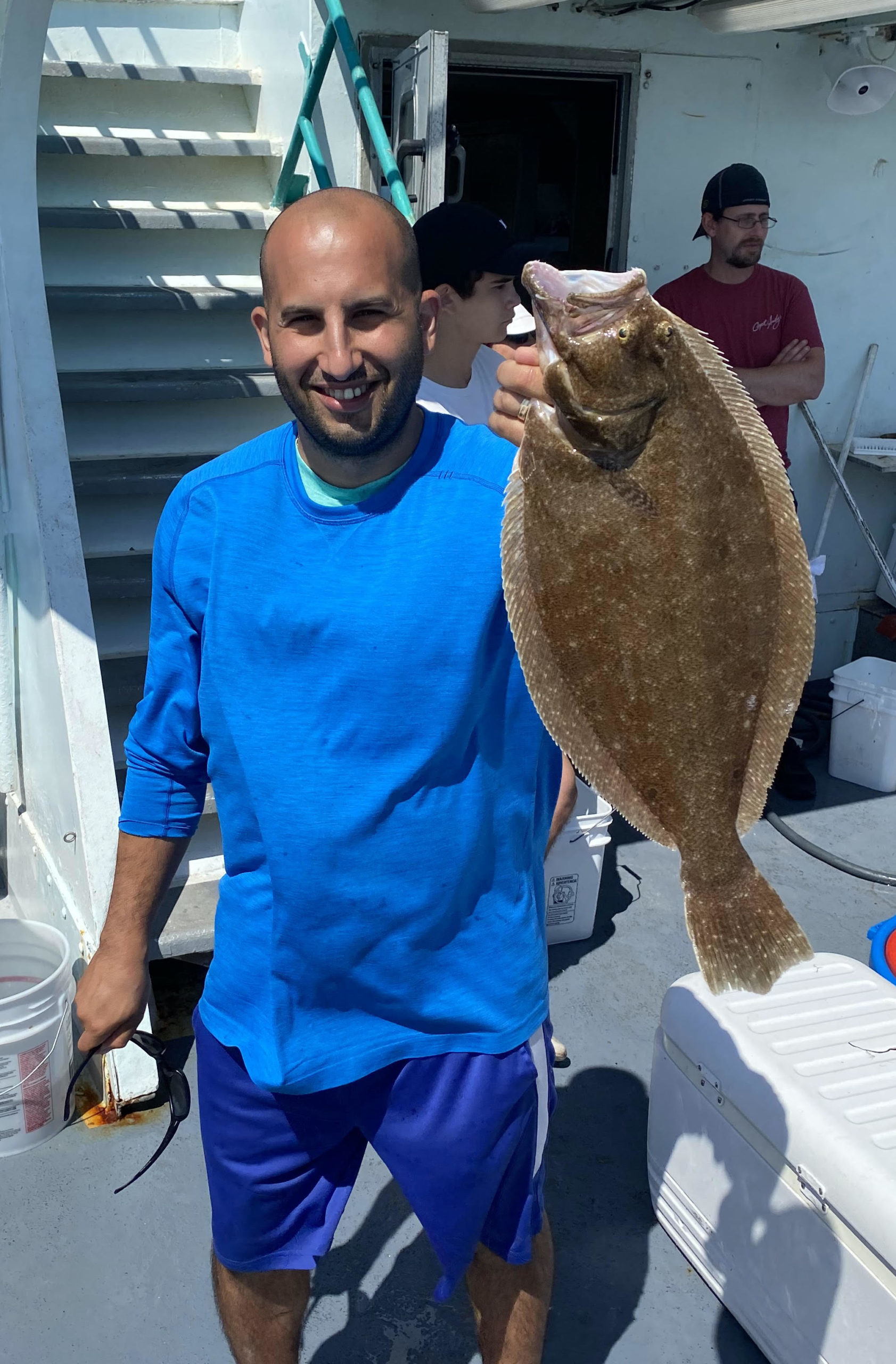 a man holding a stuffed animal