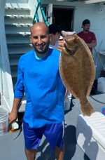 a man holding a stuffed animal