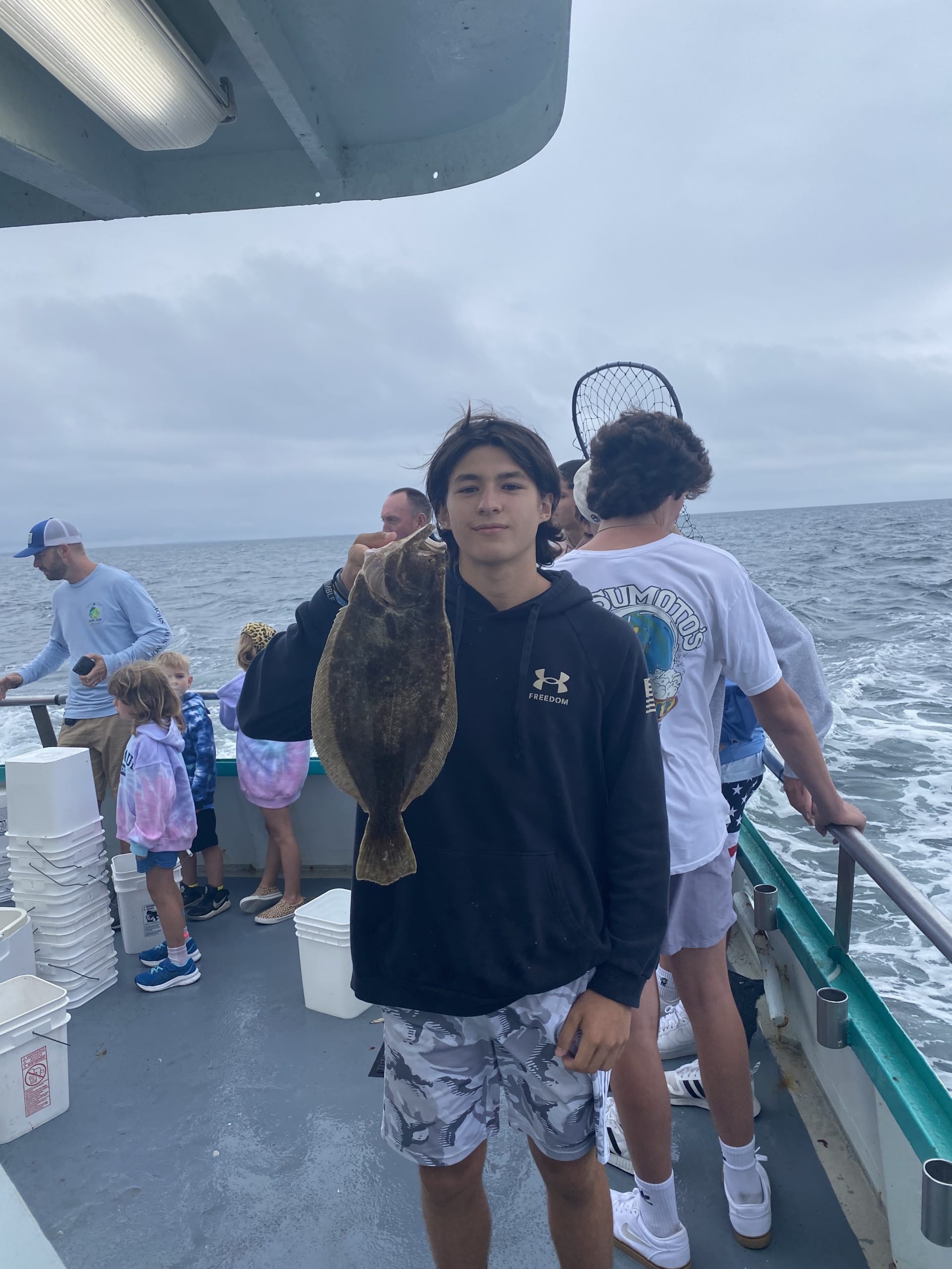 a group of people that are standing in the water