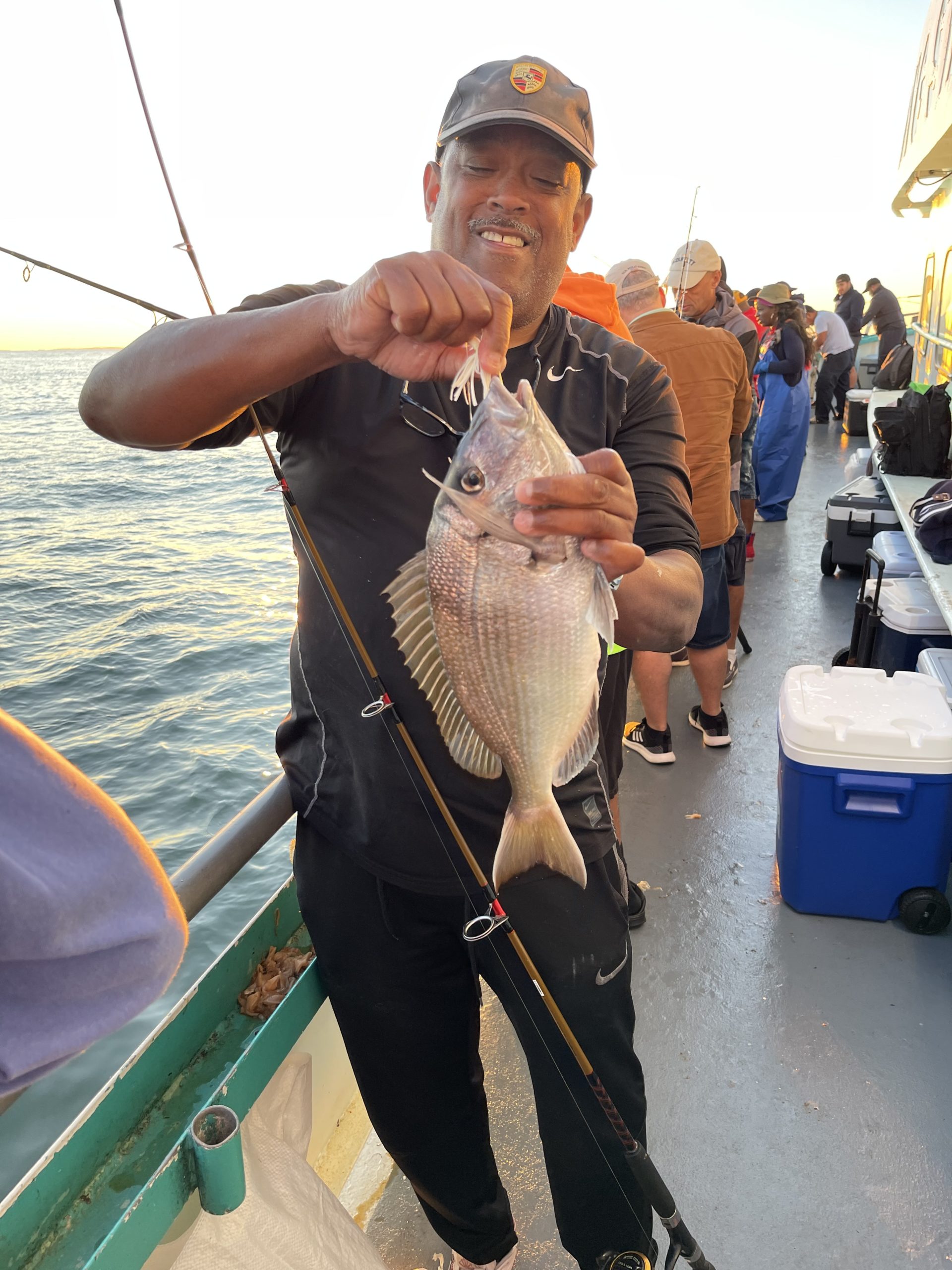 a man holding a fish