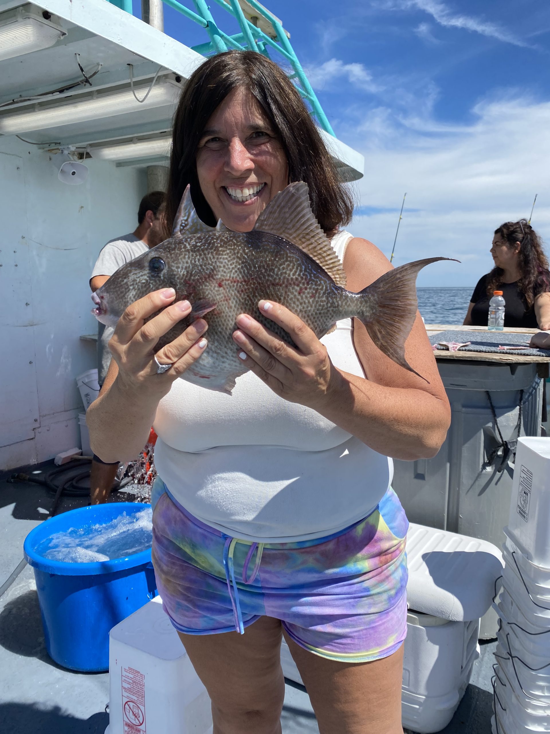 a person holding a fish