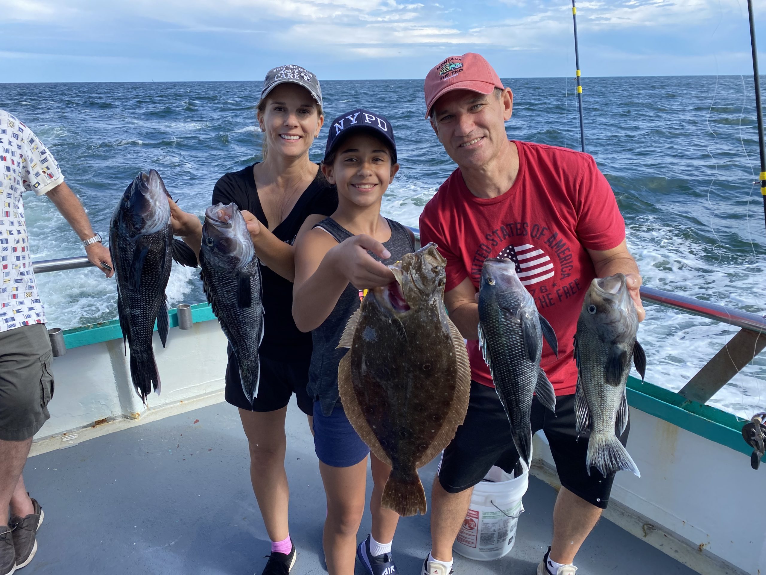a person holding a fish in the water